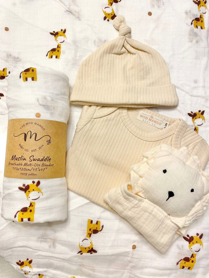 neutral baby boy gift, newborn boy gift set, gift baby boy, giraffe swaddle blanket, ribbed knit long sleeve bodysuit with knot hat, muslin swaddle organic cotton gift set baby boy, lion lovey comforter blanket