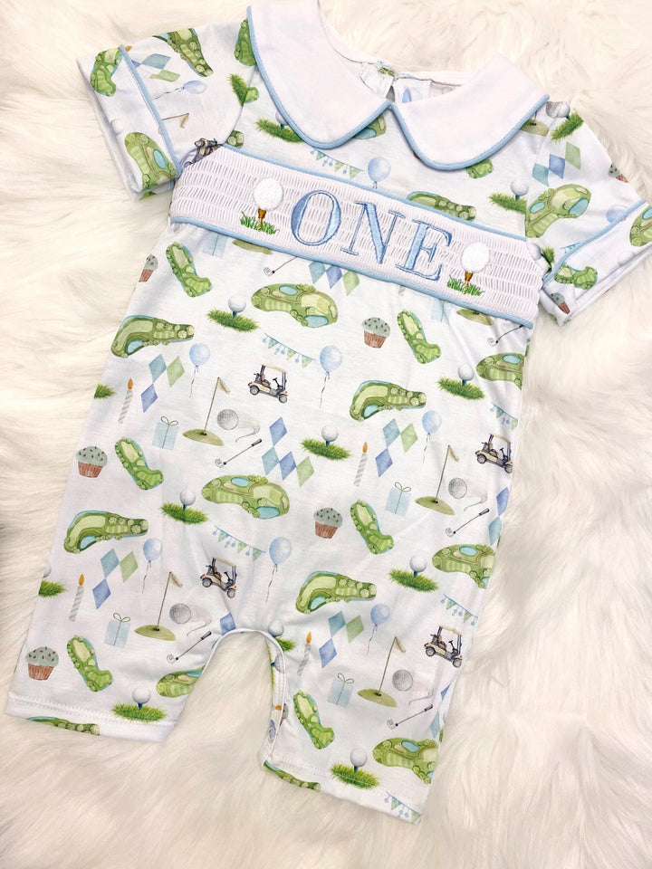 hole in one golf outfit shirt first birthday boy romper spring baby blue and white argyle blue green outfit, ONE smocked romper first birthday par tee, golfing golf balls embroidered smocked 1st birthday outfit romper baby boys, the mod mango baby boutique co