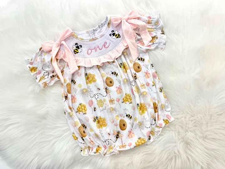 first bee day pink bow first birthday girl romper yellow pink and white outfit, girls one pink white smocked bubble romper first birthday spring summer bees bows ruffle embroidered smocked short sleeve 1st birthday outfit romper baby girls bee hive, the mod mango baby boutique co