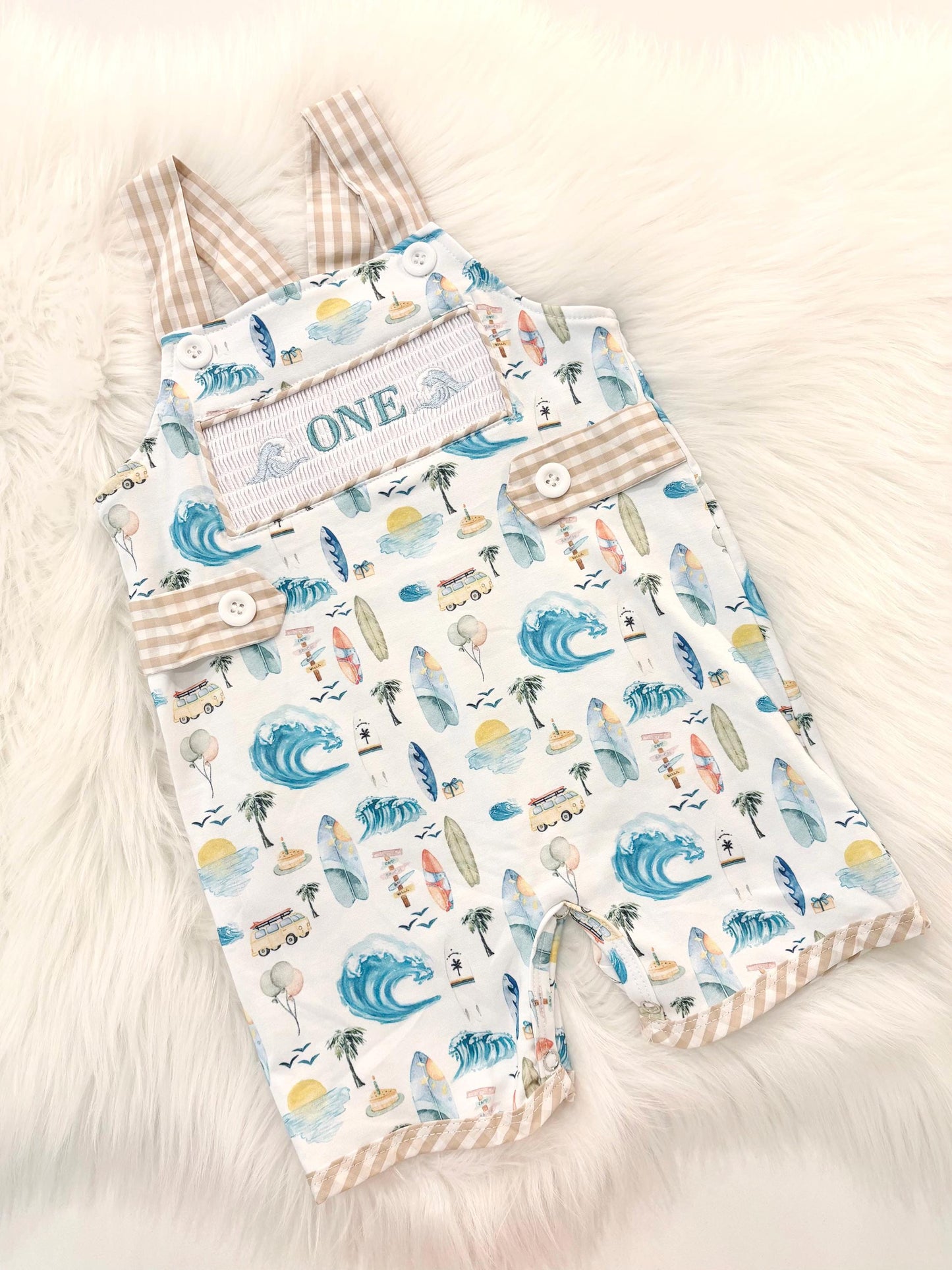 the big one first birthday boy romper my first wave summer beach surfer aqua blue tan white gingham yellow smash cake outfit overalls, ONE smocked romper first birthday beach party surfing, ocean embroidered smocked spring summer 1st birthday boy outfit romper baby boys