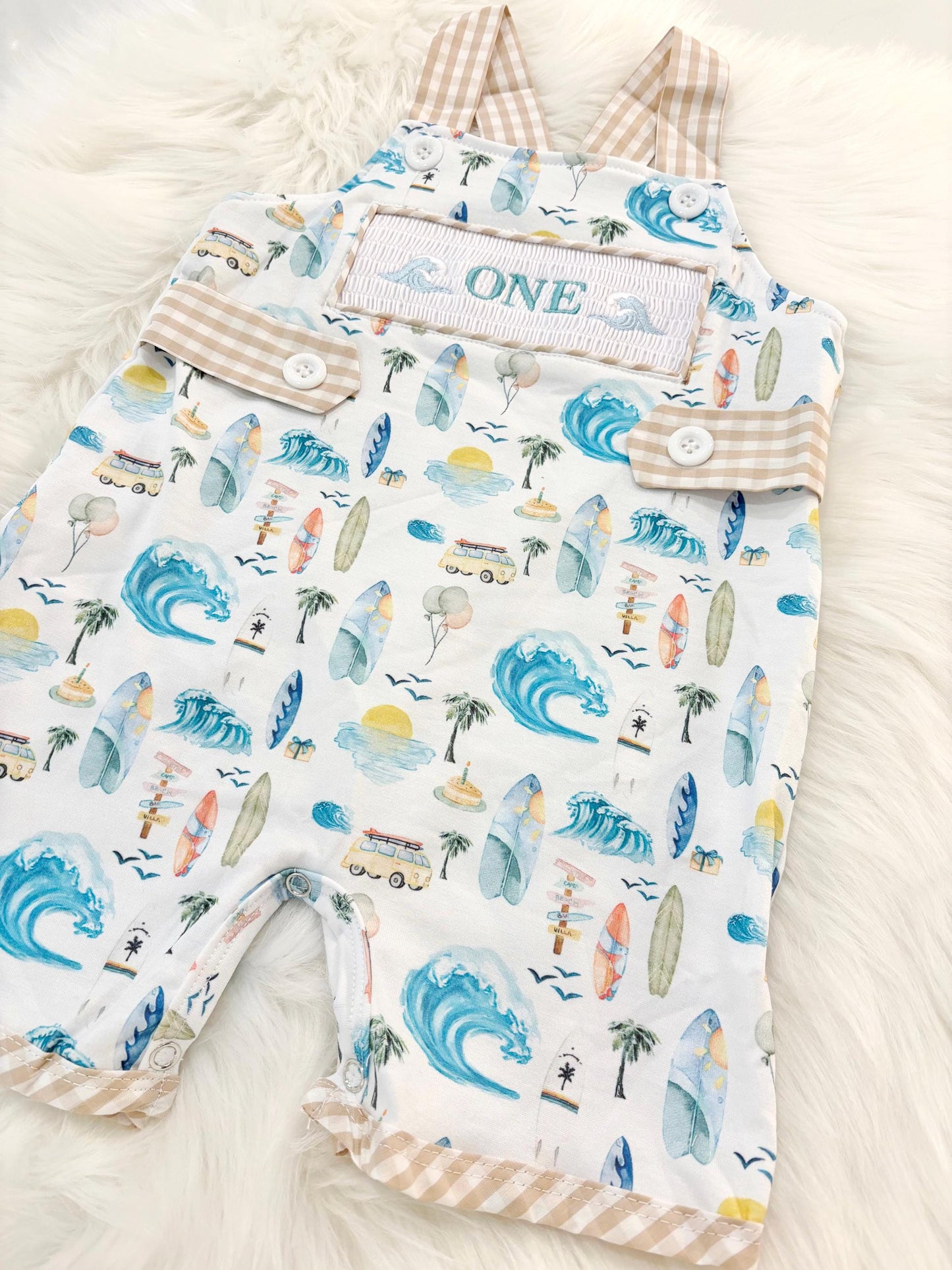 the big one first birthday boy romper my first wave summer beach surfer aqua blue tan white gingham yellow smash cake outfit overalls, ONE smocked romper first birthday beach party surfing, ocean embroidered smocked spring summer 1st birthday boy outfit romper baby boys