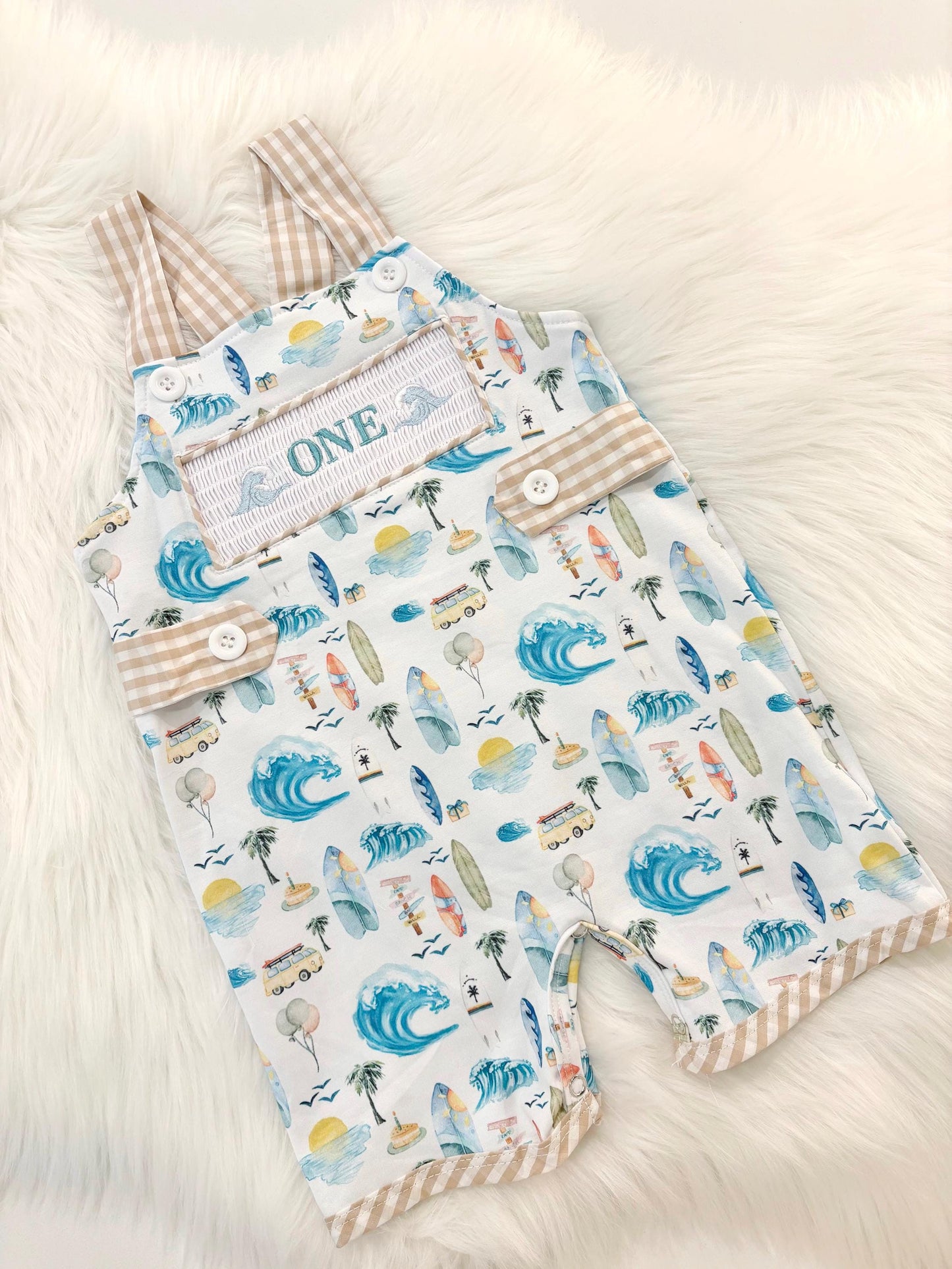 the big one first birthday boy romper my first wave summer beach surfer aqua blue tan white gingham yellow smash cake outfit overalls, ONE smocked romper first birthday beach party surfing, ocean embroidered smocked spring summer 1st birthday boy outfit romper baby boys