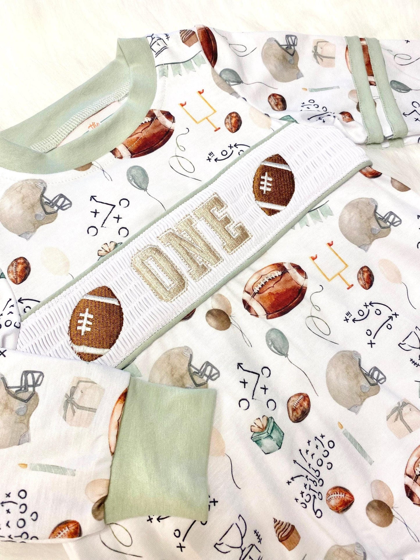 football first birthday shirt outfit romper first year down football shirt boy romper fall green brown tan beige outfit, ONE smocked bubble romper first birthday footballs, party sports embroidered smocked 1st birthday outfit romper baby boys