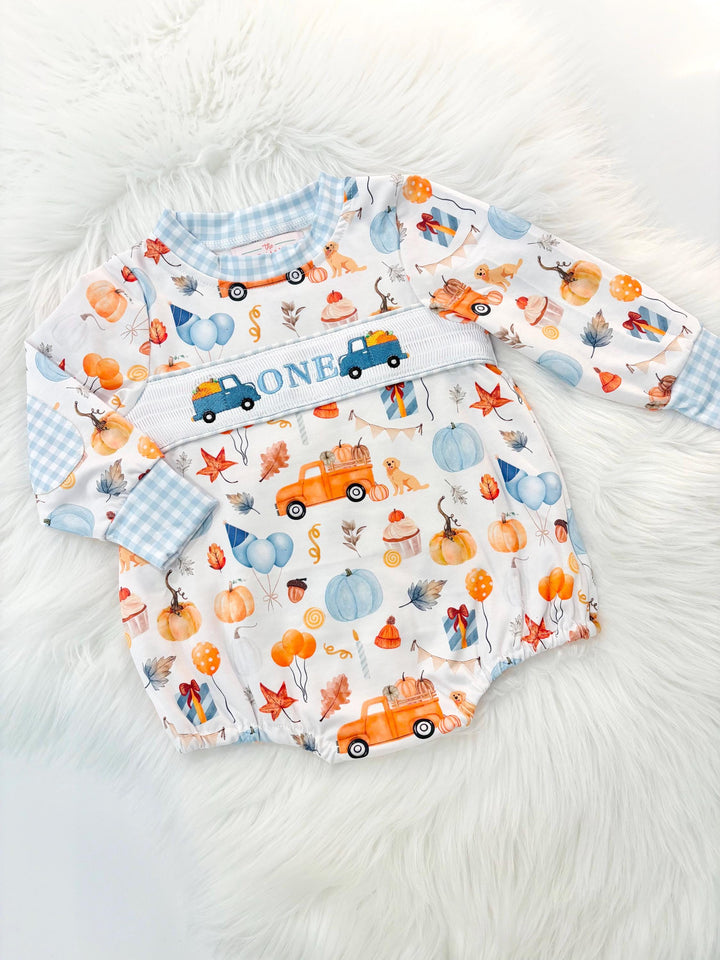 little pumpkin one shirt first birthday boy romper fall orange blue white gingham checkered outfit, ONE smocked bubble romper first birthday fall pumpkins puppy dog truck leaves blue pumpkin, pumpkin truck embroidered smocked 1st birthday outfit romper baby boys, the mod mango baby co baby boutique