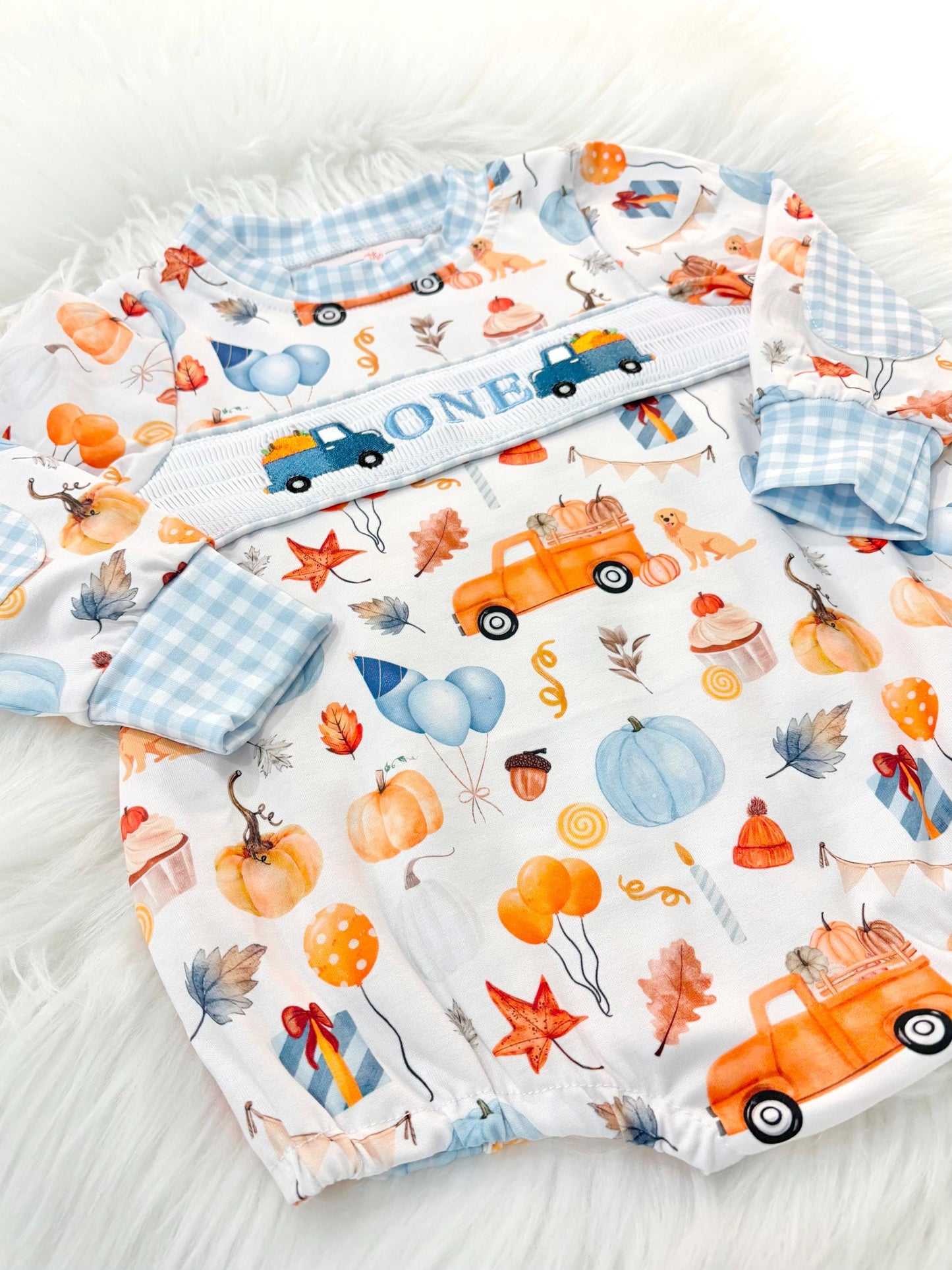 little pumpkin one shirt first birthday boy romper fall orange blue white gingham checkered outfit, ONE smocked bubble romper first birthday fall pumpkins puppy dog truck leaves blue pumpkin, pumpkin truck embroidered smocked 1st birthday outfit romper baby boys, the mod mango baby co baby boutique