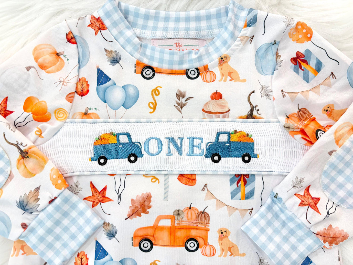 little pumpkin one shirt first birthday boy romper fall orange blue white gingham checkered outfit, ONE smocked bubble romper first birthday fall pumpkins puppy dog truck leaves blue pumpkin, pumpkin truck embroidered smocked 1st birthday outfit romper baby boys, the mod mango baby co baby boutique
