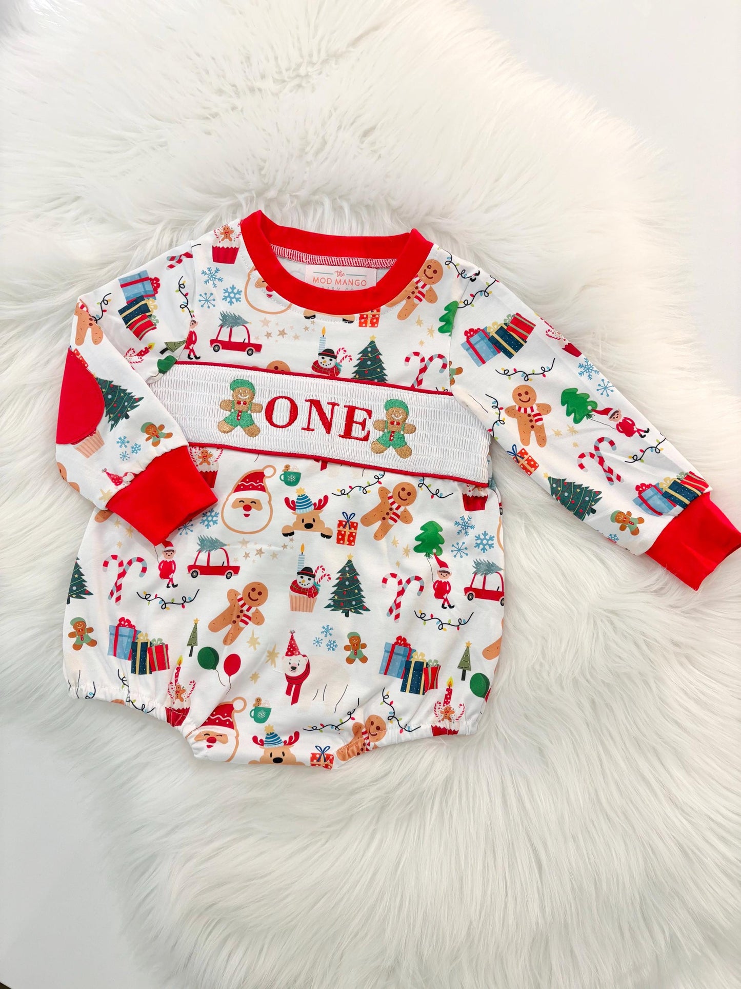 christmas gingerbread one shirt first birthday boy romper red white green blue tan holiday outfit, ONE smocked bubble romper first birthday christmas oh what fun candy canes christmas trees boys, santa claus embroidered smocked 1st birthday outfit romper baby boys, the mod mango baby co baby boutique