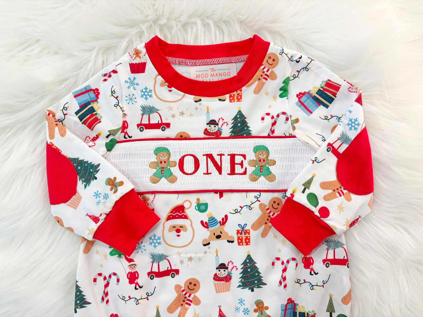 christmas gingerbread one shirt first birthday boy romper red white green blue tan holiday outfit, ONE smocked bubble romper first birthday christmas oh what fun candy canes christmas trees boys, santa claus embroidered smocked 1st birthday outfit romper baby boys, the mod mango baby co baby boutique
