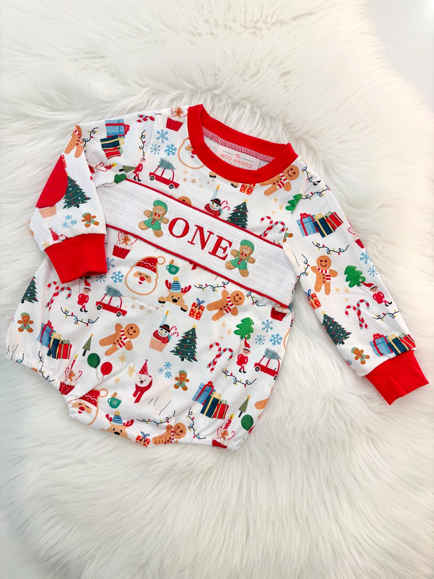 christmas gingerbread one shirt first birthday boy romper red white green blue tan holiday outfit, ONE smocked bubble romper first birthday christmas oh what fun candy canes christmas trees boys, santa claus embroidered smocked 1st birthday outfit romper baby boys, the mod mango baby co baby boutique