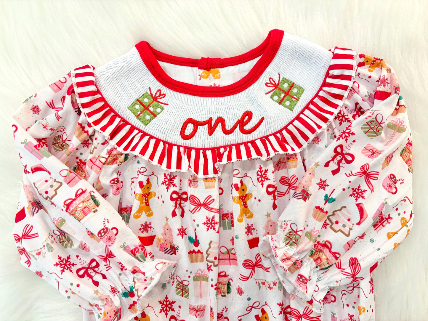 red christmas bow oh what fun it is to be one first birthday girl romper red green white pink outfit, red and white striped stripes ruffle smocked bubble romper first birthday holiday christmas ruffle bows embroidered smocked long sleeve 1st birthday outfit romper baby girls, the mod mango, the mod mango baby co baby boutique