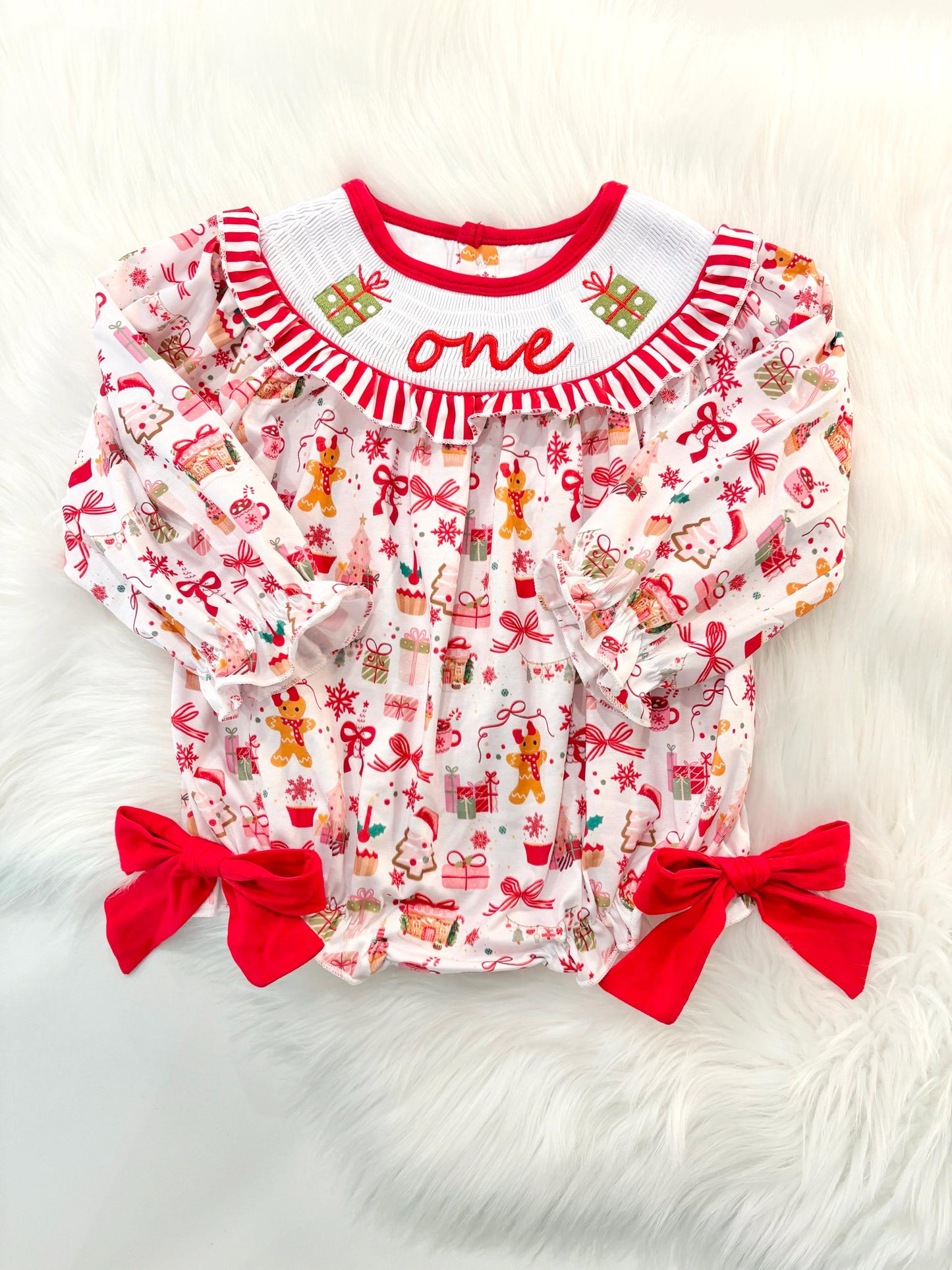red christmas bow oh what fun it is to be one first birthday girl romper red green white pink outfit, red and white striped stripes ruffle smocked bubble romper first birthday holiday christmas ruffle bows embroidered smocked long sleeve 1st birthday outfit romper baby girls, the mod mango, the mod mango baby co baby boutique