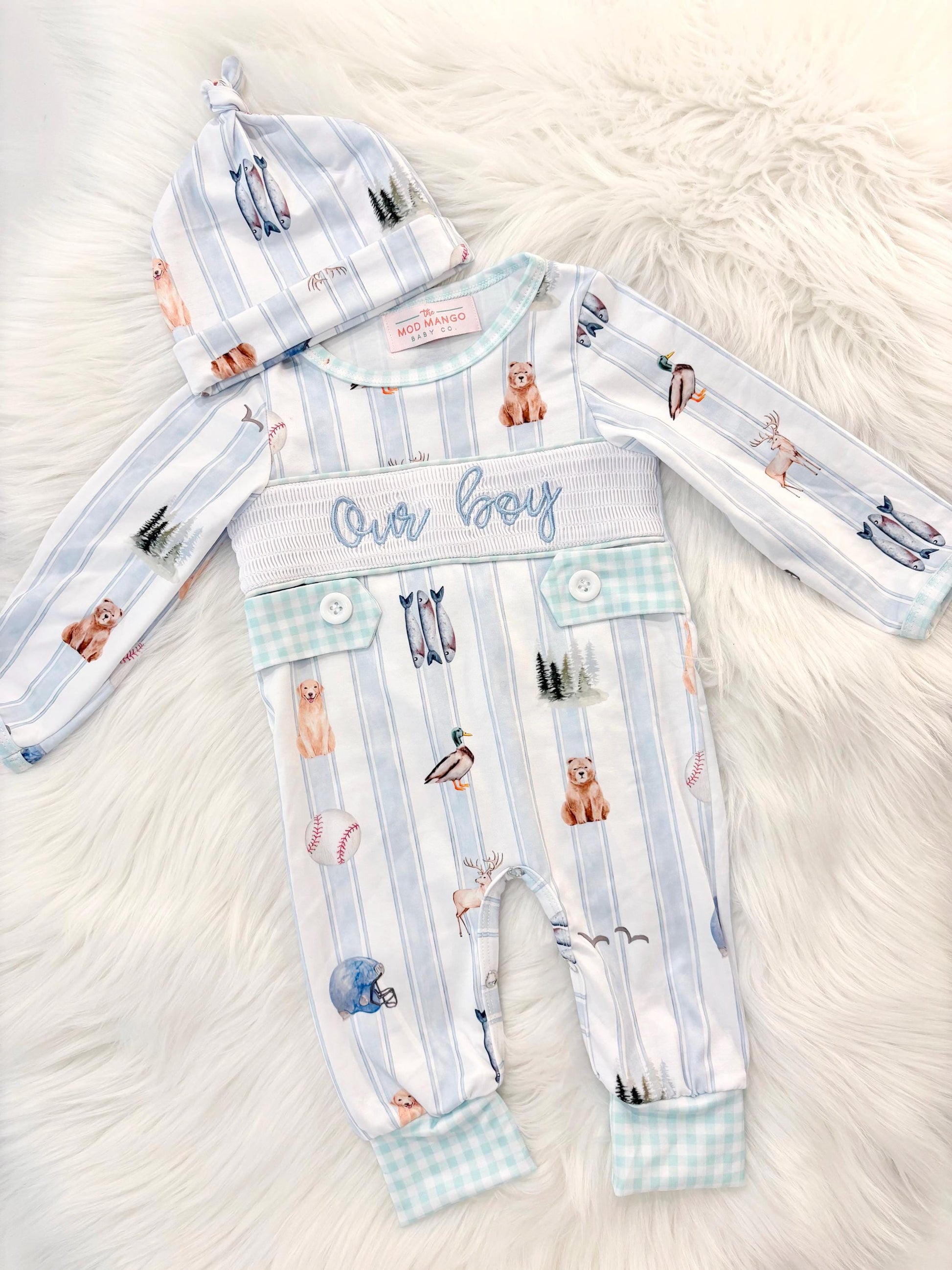 newborn boys baby blue and white smocked baby romper outfit bodysuit and knotted hat with stripes and boy hunting for baby, fish buck deer bear football sports baseball mallard duck puppy dog pine trees outdoor all american boy, our boy monogram baby shower gift for boy, light blue and mint green gingham baby gift, newborn coming home outfit, baby shower gift set, pregnancy announcement, custom newborn baby romper outfit, boutique smocked baby gift set, the mod mango baby boutique co