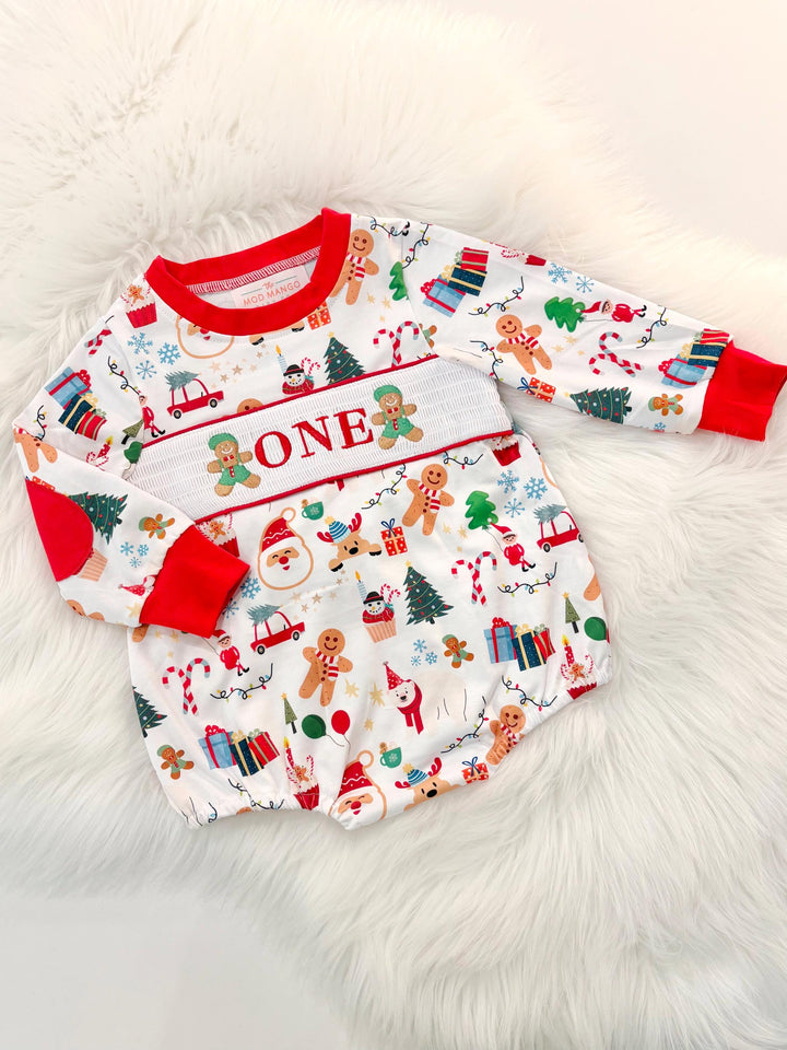 christmas gingerbread one shirt first birthday boy romper red white green blue tan holiday outfit, ONE smocked bubble romper first birthday christmas oh what fun candy canes christmas trees boys, santa claus embroidered smocked 1st birthday outfit romper baby boys, the mod mango baby co baby boutique