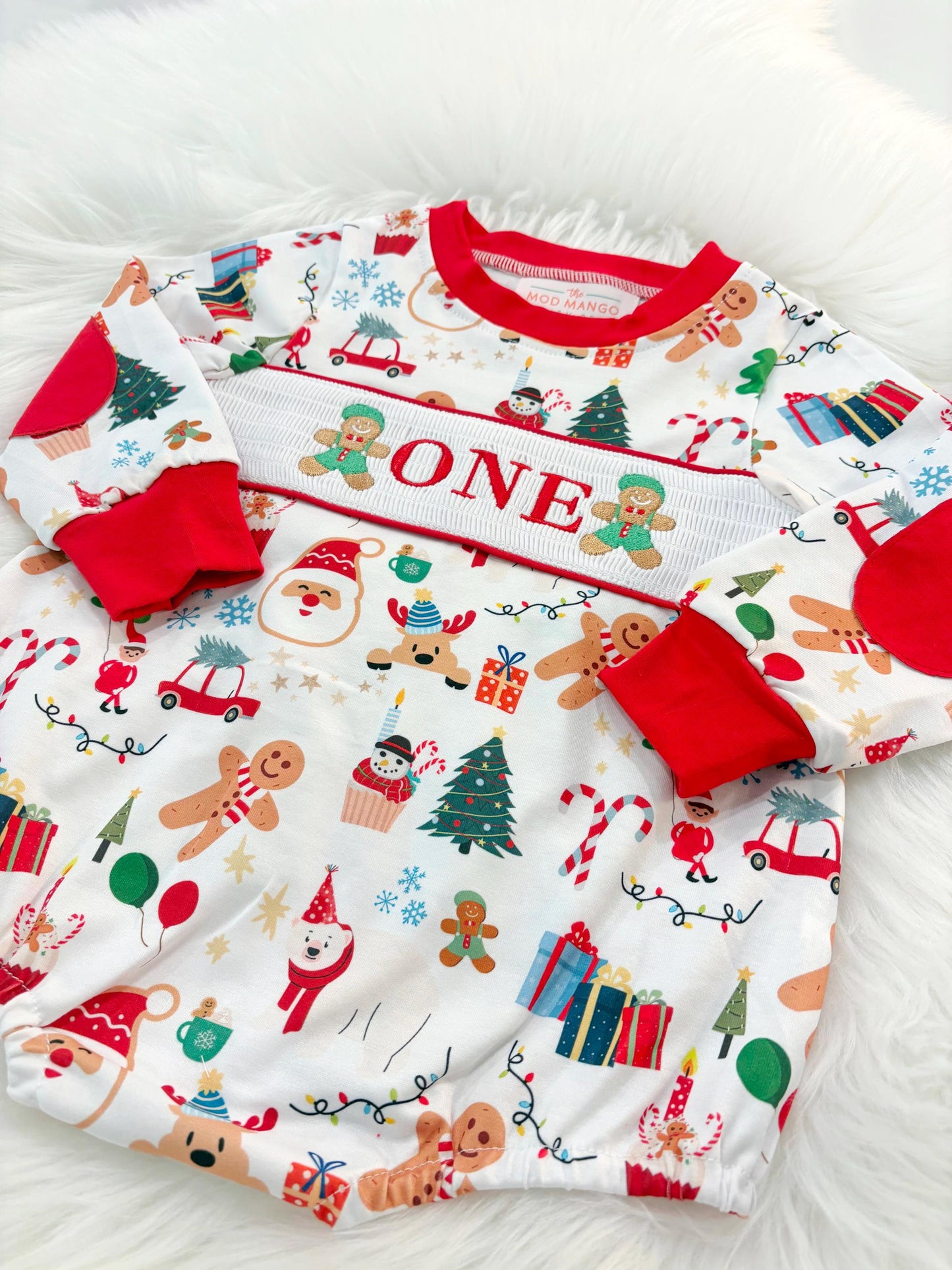 christmas gingerbread one shirt first birthday boy romper red white green blue tan holiday outfit, ONE smocked bubble romper first birthday christmas oh what fun candy canes christmas trees boys, santa claus embroidered smocked 1st birthday outfit romper baby boys, the mod mango baby co baby boutique
