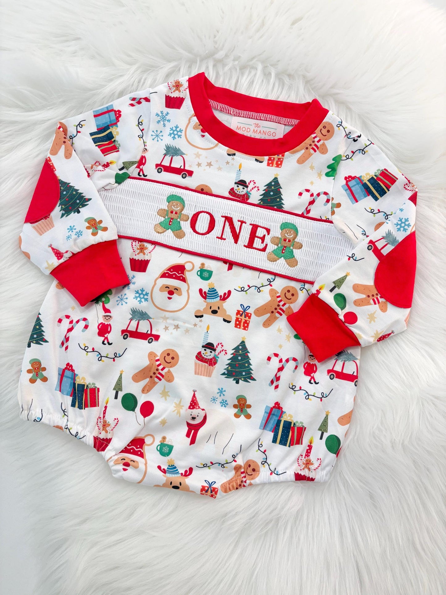 christmas gingerbread one shirt first birthday boy romper red white green blue tan holiday outfit, ONE smocked bubble romper first birthday christmas oh what fun candy canes christmas trees boys, santa claus embroidered smocked 1st birthday outfit romper baby boys, the mod mango baby co baby boutique
