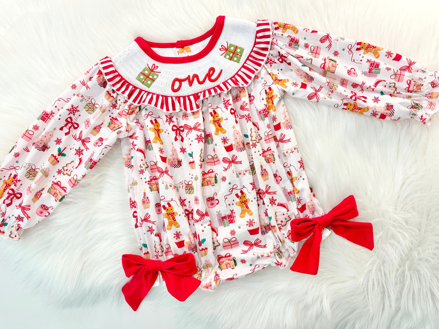red christmas bow oh what fun it is to be one first birthday girl romper red green white pink outfit, red and white striped stripes ruffle smocked bubble romper first birthday holiday christmas ruffle bows embroidered smocked long sleeve 1st birthday outfit romper baby girls, the mod mango, the mod mango baby co baby boutique
