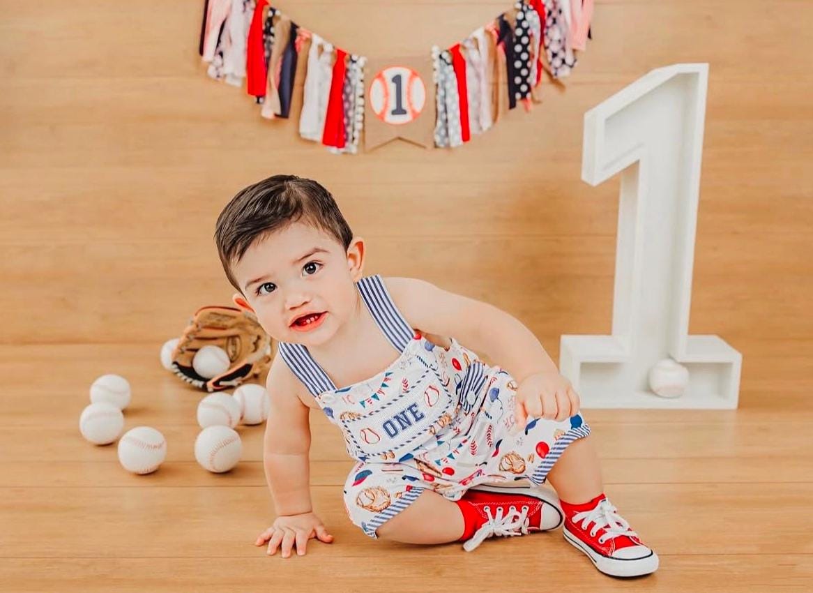 roockie of the year cake smash outfit first birthday boy romper baseball royal blue red tan beige smash cake outfit overalls, ONE smocked romper first birthday baseballs, sports embroidered smocked spring summer 1st birthday boy outfit romper cake smash outfit baby boys, the mod mango baby boutique co