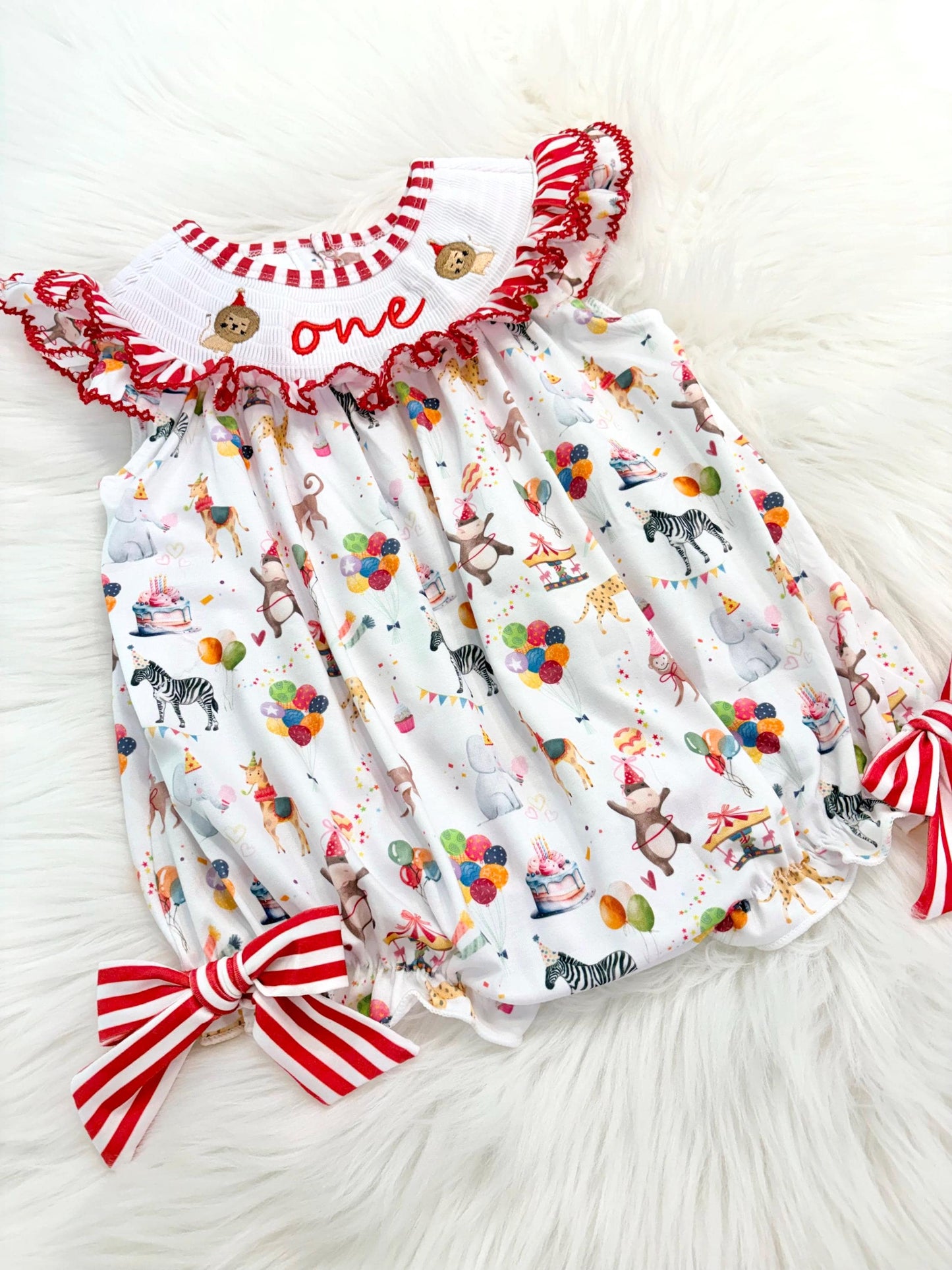 carnival circus party animal cake smash outfit first birthday girl romper 1st birthday red and white striped stripes colorful smash cake outfit bubble romper flutter sleeves, ONE smocked romper first birthday, animals lion embroidered smocked spring summer 1st birthday girl outfit romper baby girls cake smash outfit, the mod mango baby boutique co