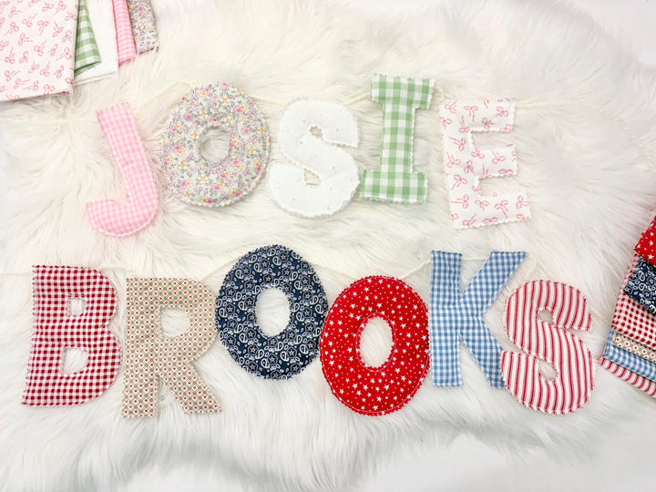 custom baby name sign banner keepsake, boys girls happy birthday banner, one banner, name banner, letter banner for baby, colorful custom letter banner for babys room, banner for hospital, newborn baby shower gift, the mod mango baby co