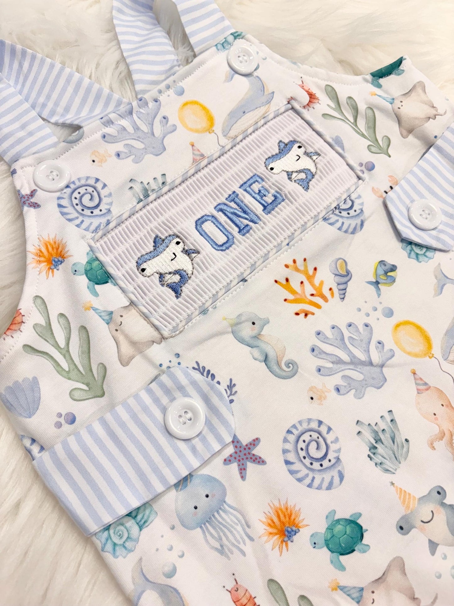 oneder the sea cake smash outfit first birthday boy romper under the sea ocean summer baby blue green white orange blue smash cake outfit overalls, ONE smocked romper first birthday sea ocean creatures party fish, beach ocean shark whale seashells octopus outdoors embroidered smocked spring summer 1st birthday boy outfit romper baby boys cake smash outfit, the mod mango baby boutique co