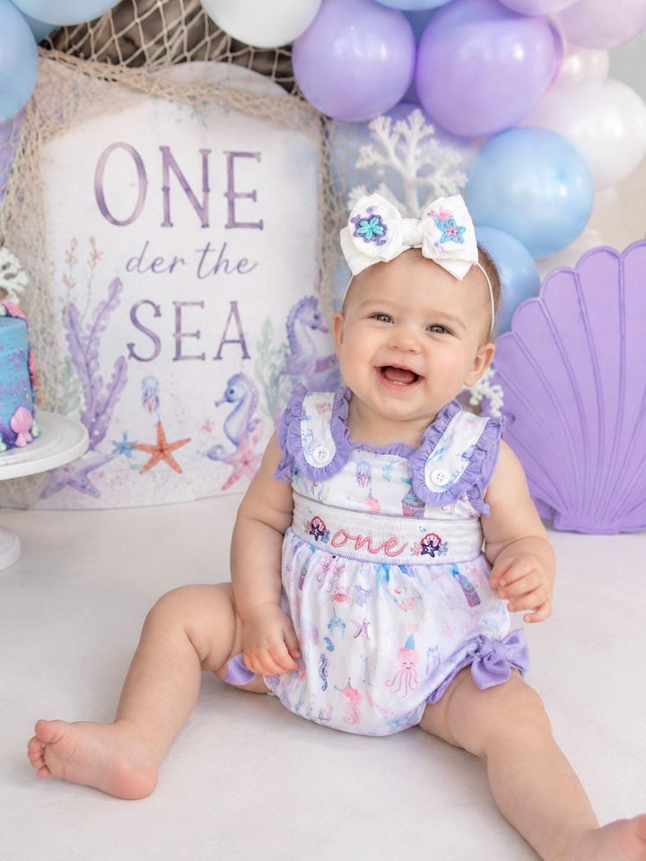 first shellebration oneder the sea first birthday outfit bubble romper mermaid purple pink aqua turquoise ocean party and bows first birthday girl romper pink ruffle sea baby outfit, girls under the sea smocked bubble romper first birthday summer bows ruffle embroidered smocked seashell seahorse jellyfish 1st birthday outfit romper baby girl cake smash outfit summertime, pink turquoise yellow octopus, the mod mango baby boutique co