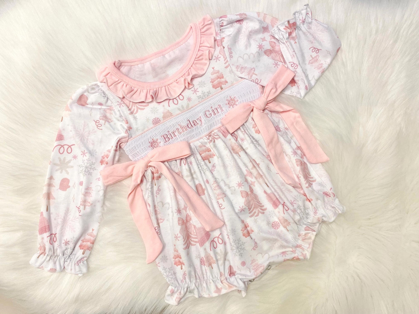 Winter ONEderland Smocked Romper, Pink Snowflake First Birthday Outfit The Mod Mango Baby Co. Winter ONEderland Smocked Romper, Pink Snowflake First Birthday Outfit The Mod Mango Baby Co.