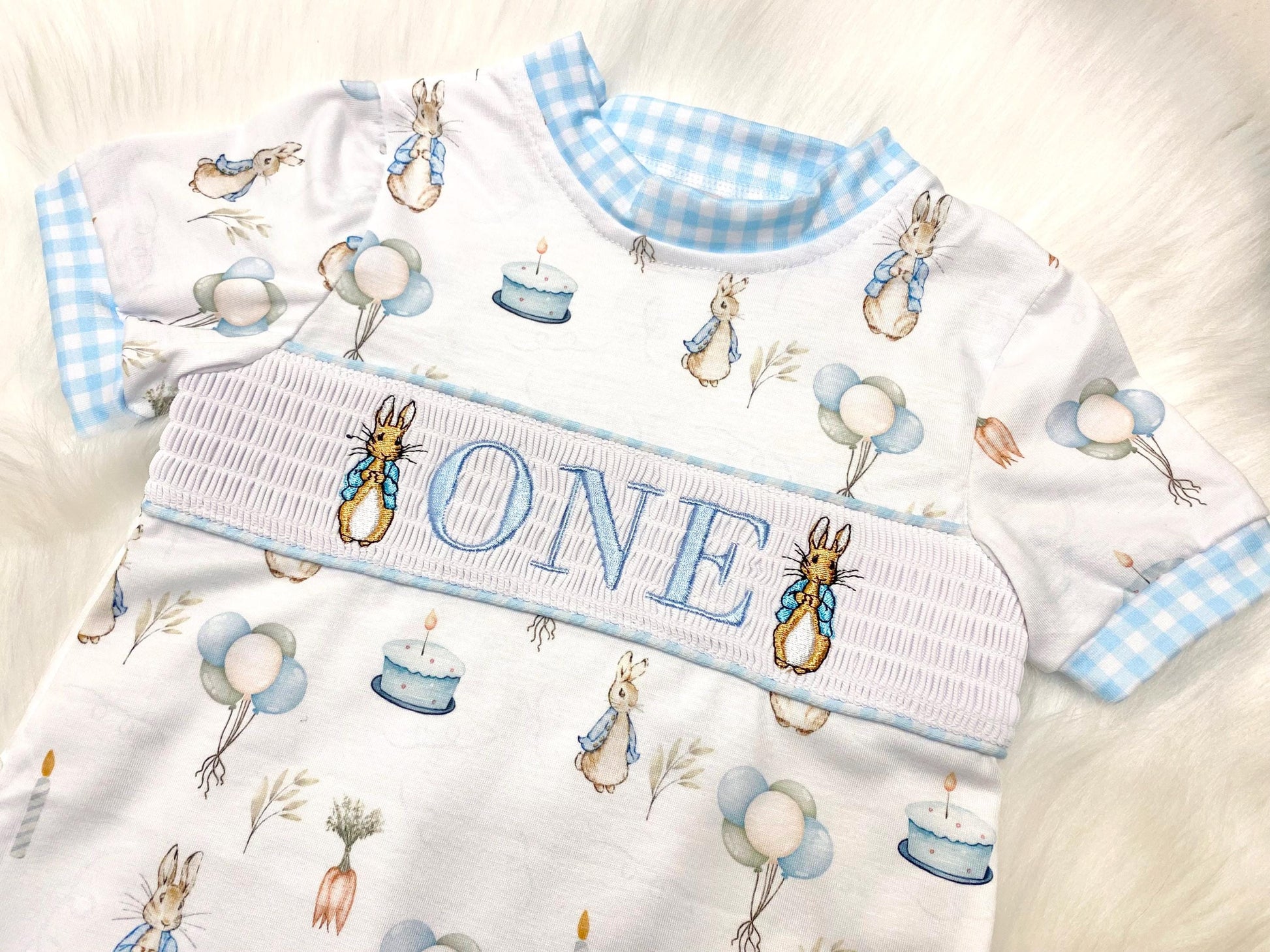 peter rabbit shirt first birthday boy romper spring baby blue and white gingham checkered tan beige outfit, ONE smocked bubble romper first birthday bunny rabbit, some bunny is one embroidered smocked 1st birthday outfit romper baby boys easter