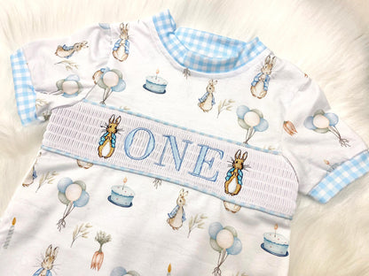 peter rabbit shirt first birthday boy romper spring baby blue and white gingham checkered tan beige outfit, ONE smocked bubble romper first birthday bunny rabbit, some bunny is one embroidered smocked 1st birthday outfit romper baby boys easter