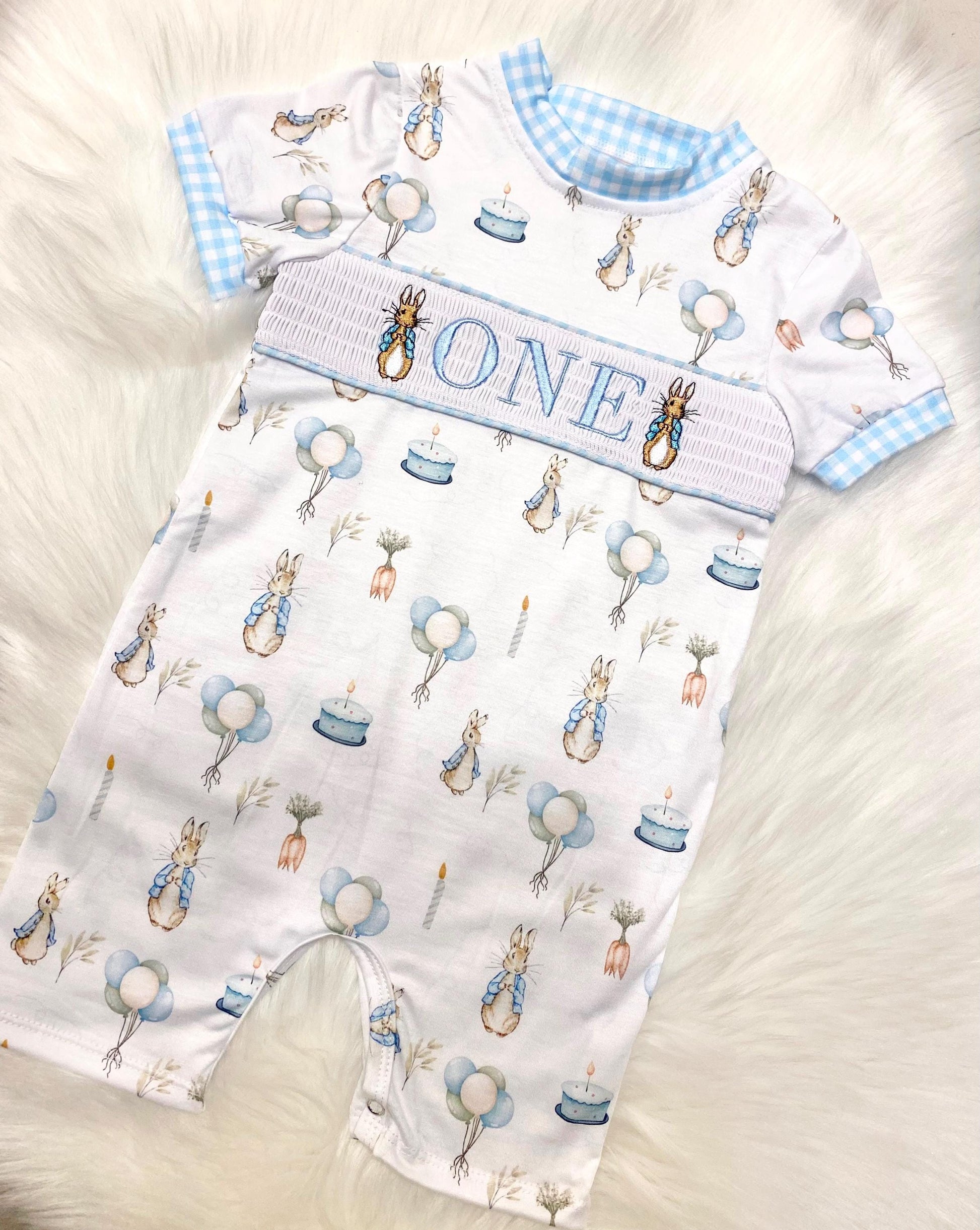 peter rabbit shirt first birthday boy romper spring baby blue and white gingham checkered tan beige outfit, ONE smocked bubble romper first birthday bunny rabbit, some bunny is one embroidered smocked 1st birthday outfit romper baby boys easter