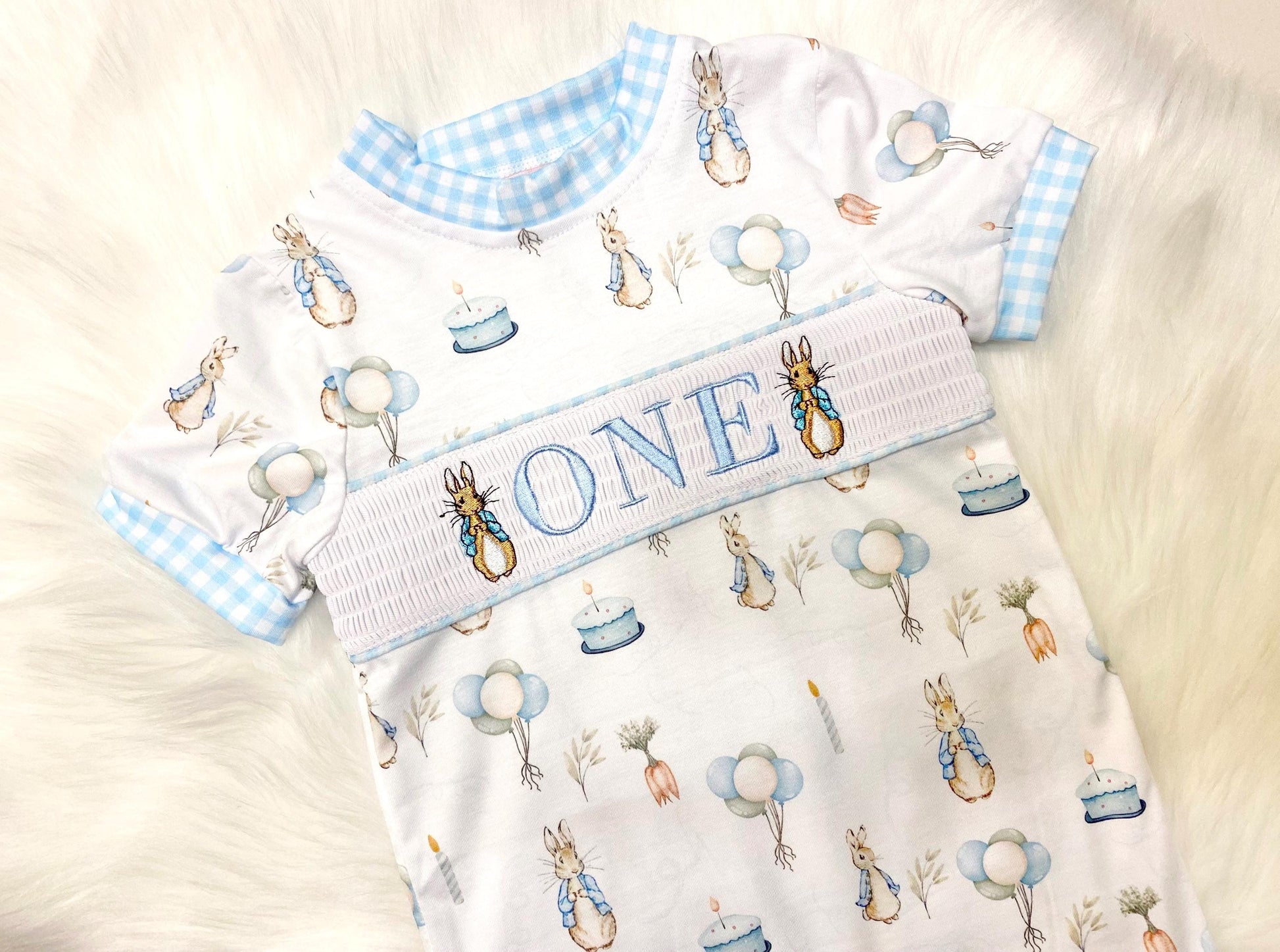 peter rabbit shirt first birthday boy romper spring baby blue and white gingham checkered tan beige outfit, ONE smocked bubble romper first birthday bunny rabbit, some bunny is one embroidered smocked 1st birthday outfit romper baby boys easter