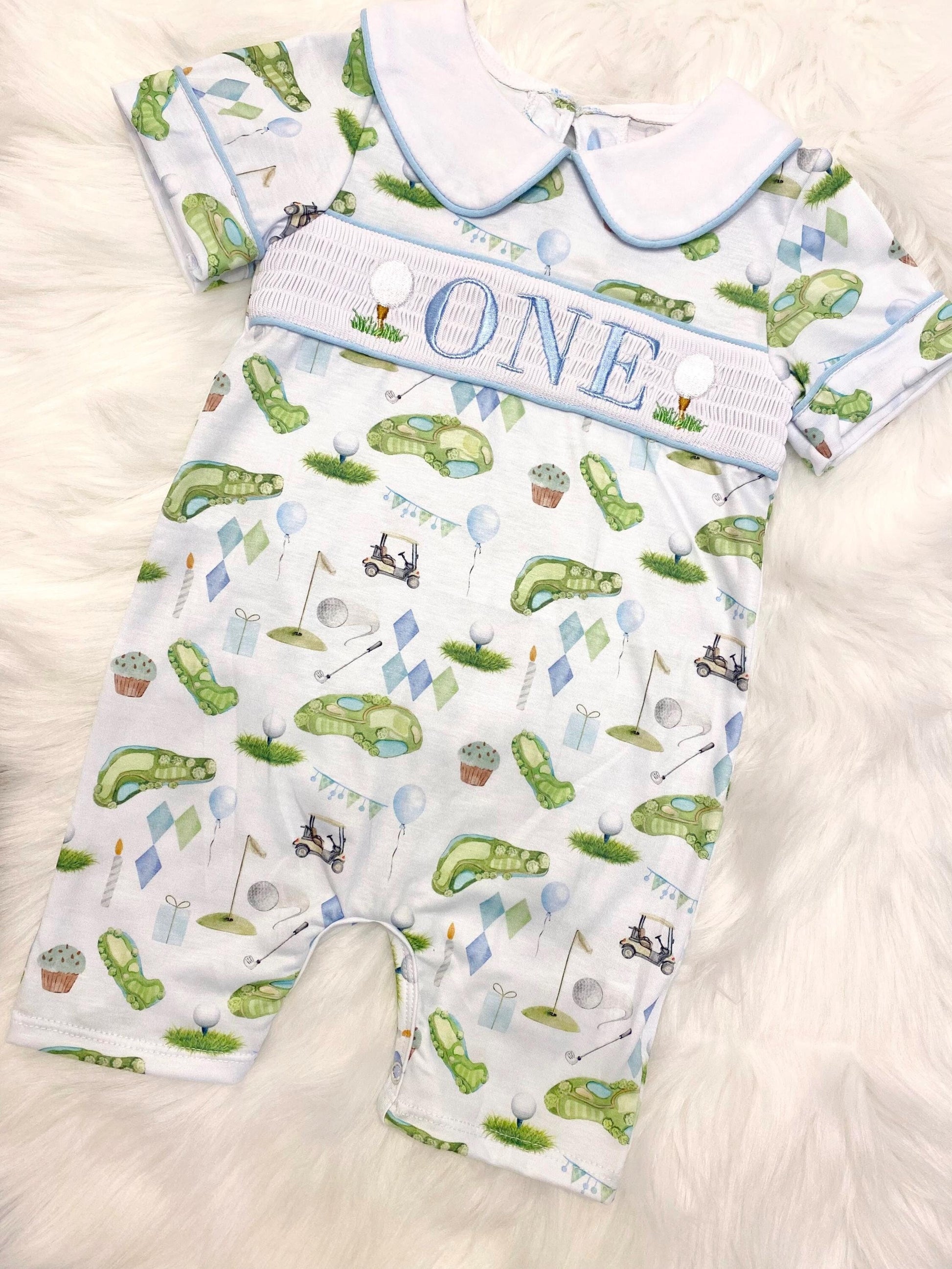 hole in one golf outfit shirt first birthday boy romper spring baby blue and white argyle blue green outfit, ONE smocked romper first birthday par tee, golfing golf balls embroidered smocked 1st birthday outfit romper baby boys, the mod mango baby boutique co