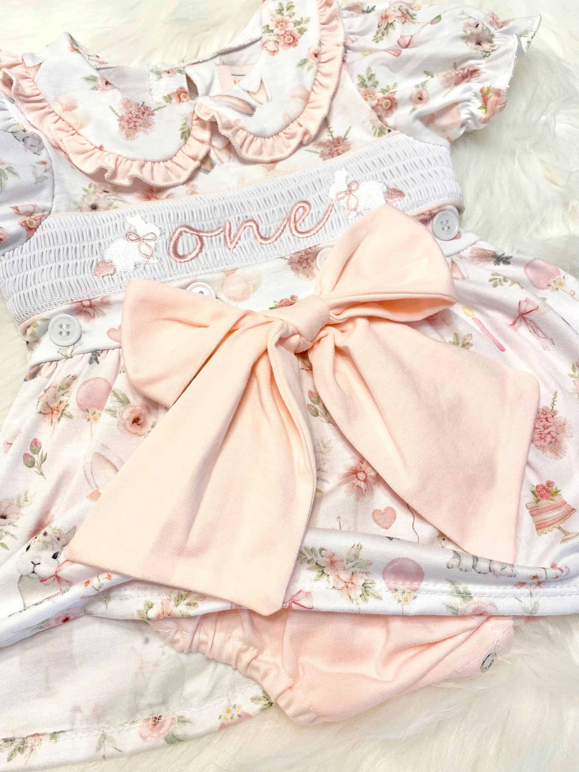some bunny is one  pink bow first birthday girl romper pink and white outfit, girls one pink white smocked romper dress first birthday spring bunny rabbit easter bow ruffle embroidered smocked short sleeve 1st birthday outfit romper baby girls