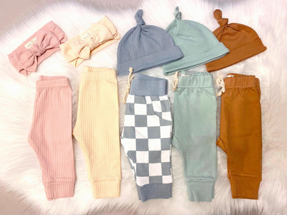 newborn baby girl leggings set with Headband, newborn baby boy joggers set with hat, blush pink cream blue checkered sage green brown, going home outfit, organic cotton baby pants ribbed knot tie hat headwrap headband bow, the mod mango baby boutique co