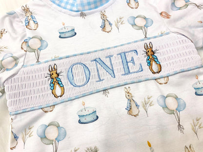 peter rabbit shirt first birthday boy romper spring baby blue and white gingham checkered tan beige outfit, ONE smocked bubble romper first birthday bunny rabbit, some bunny is one embroidered smocked 1st birthday outfit romper baby boys easter