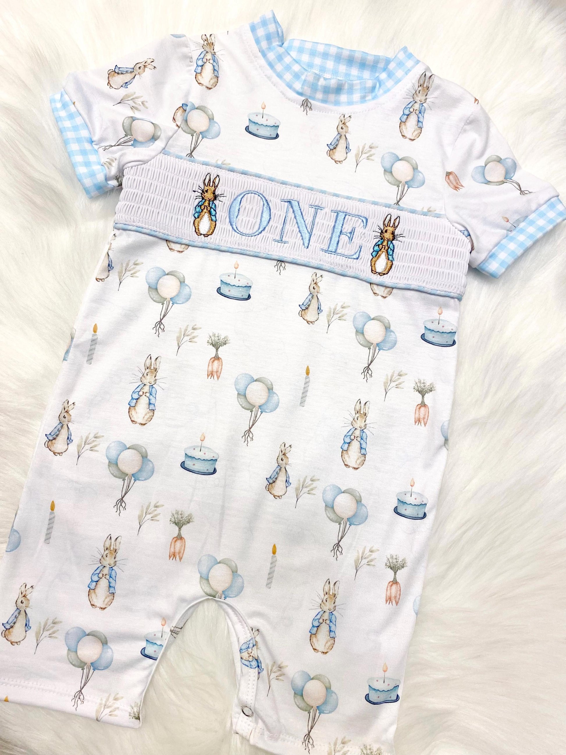 peter rabbit shirt first birthday boy romper spring baby blue and white gingham checkered tan beige outfit, ONE smocked bubble romper first birthday bunny rabbit, some bunny is one embroidered smocked 1st birthday outfit romper baby boys easter