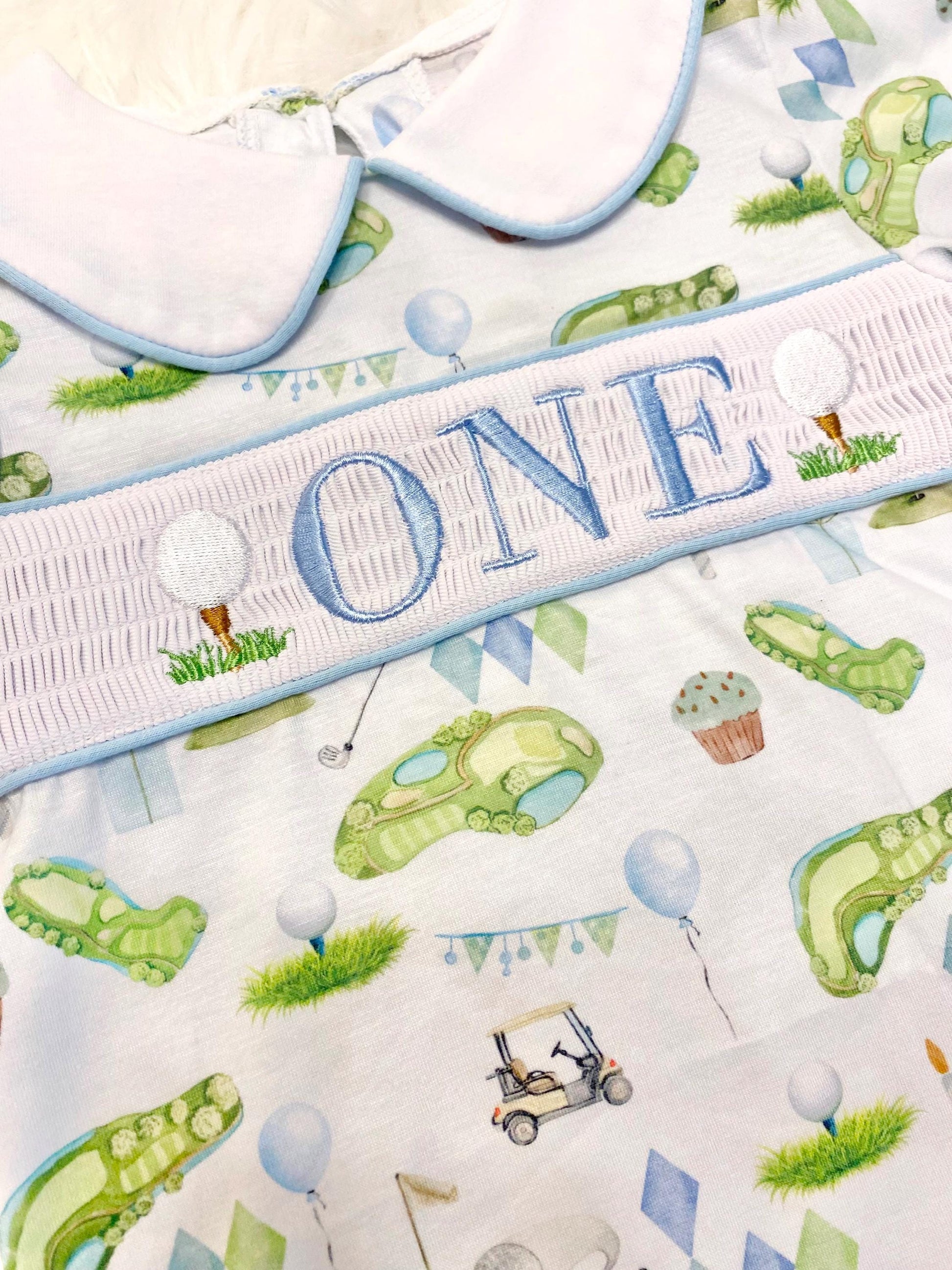 hole in one golf outfit shirt first birthday boy romper spring baby blue and white argyle blue green outfit, ONE smocked romper first birthday par tee, golfing golf balls embroidered smocked 1st birthday outfit romper baby boys