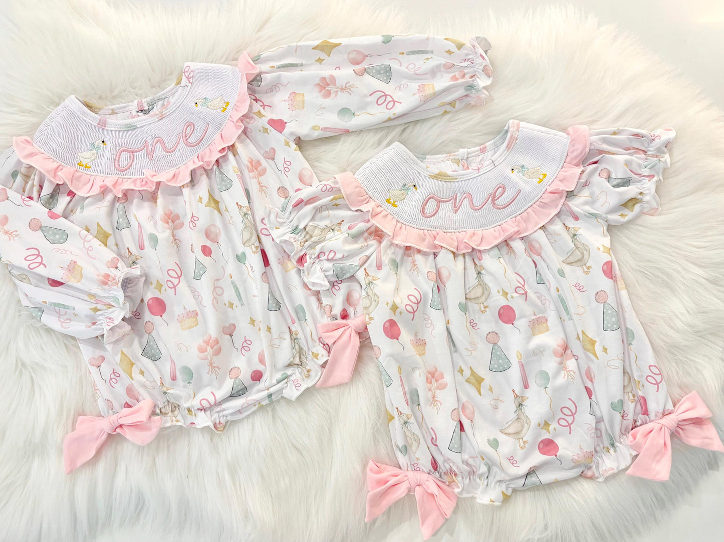 one silly goose girls first birthday bubble romper outfit pink bows first birthday girl romper pink and white outfit, pink sage green smocked dress first birthday embroidered  goose smocked short sleeve 1st birthday outfit ruffle dress baby girls