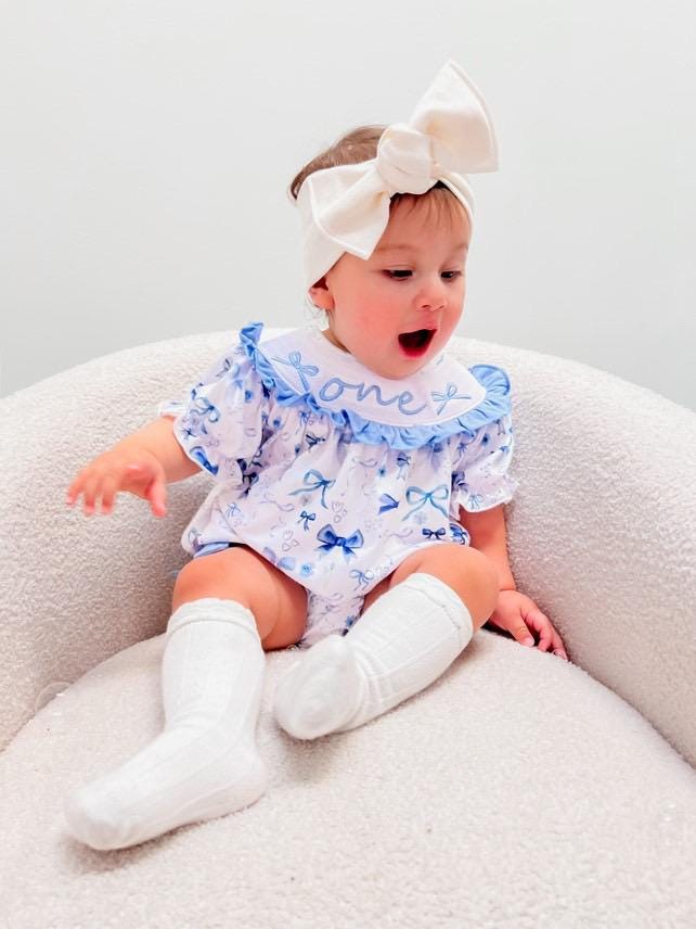 blue bow first birthday girl romper blue and white outfit, love shack fancy one bubble girls just want to be one smocked bubble romper first birthday winter bows ruffle bows  embroidered smocked short sleeve 1st birthday outfit romper baby girls