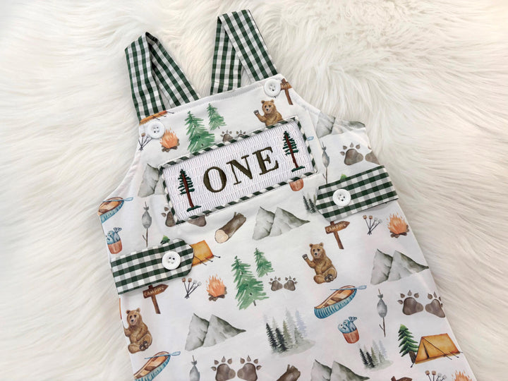 one happy camper first birthday boy romper camping hunter green white gingham tan beige brown smash cake outfit overalls, ONE smocked romper first birthday camping, outdoors embroidered smocked spring summer 1st birthday boy outfit romper baby boys