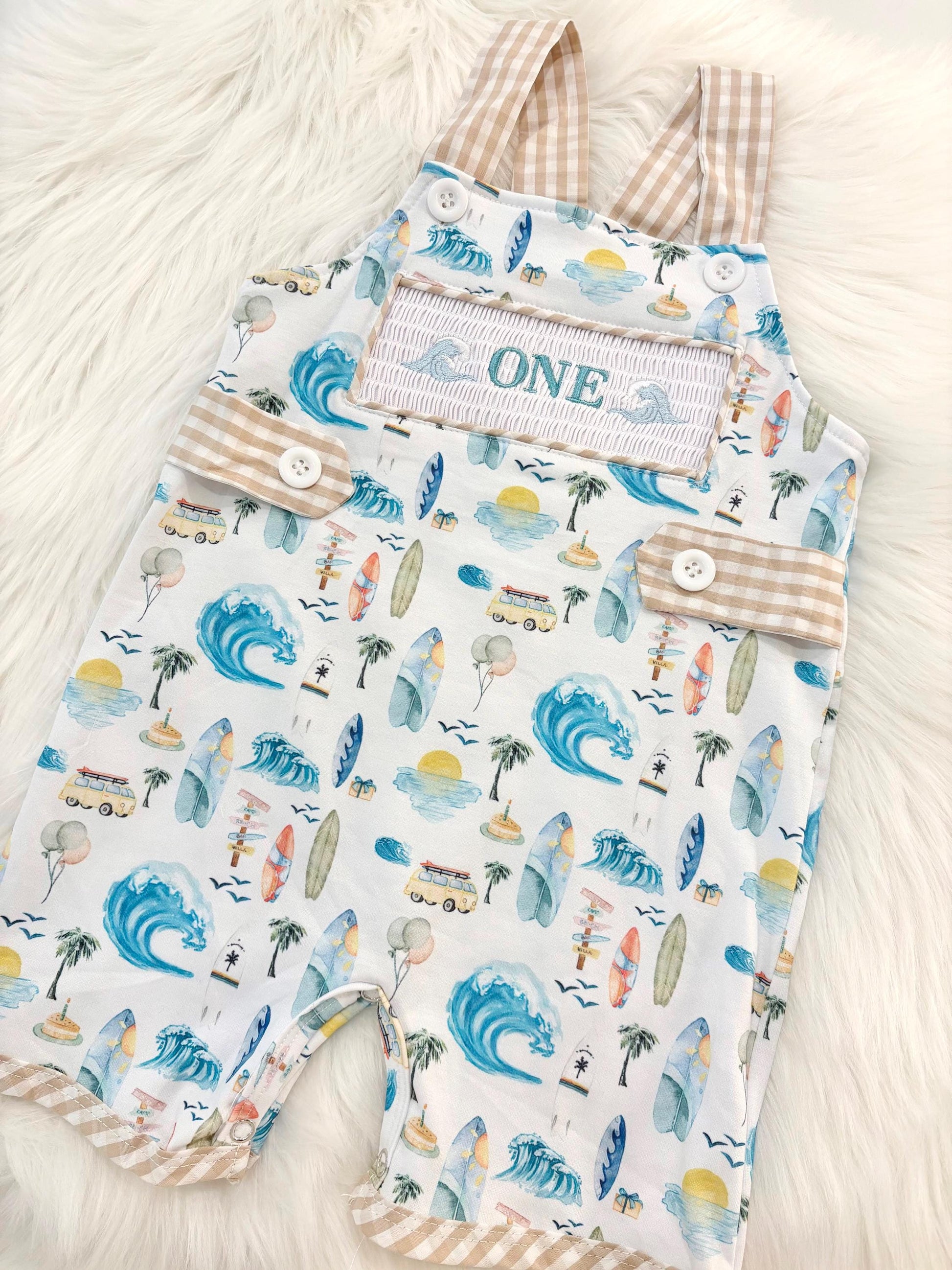 the big one first birthday boy romper my first wave summer beach surfer aqua blue tan white gingham yellow smash cake outfit overalls, ONE smocked romper first birthday beach party surfing, ocean embroidered smocked spring summer 1st birthday boy outfit romper baby boys