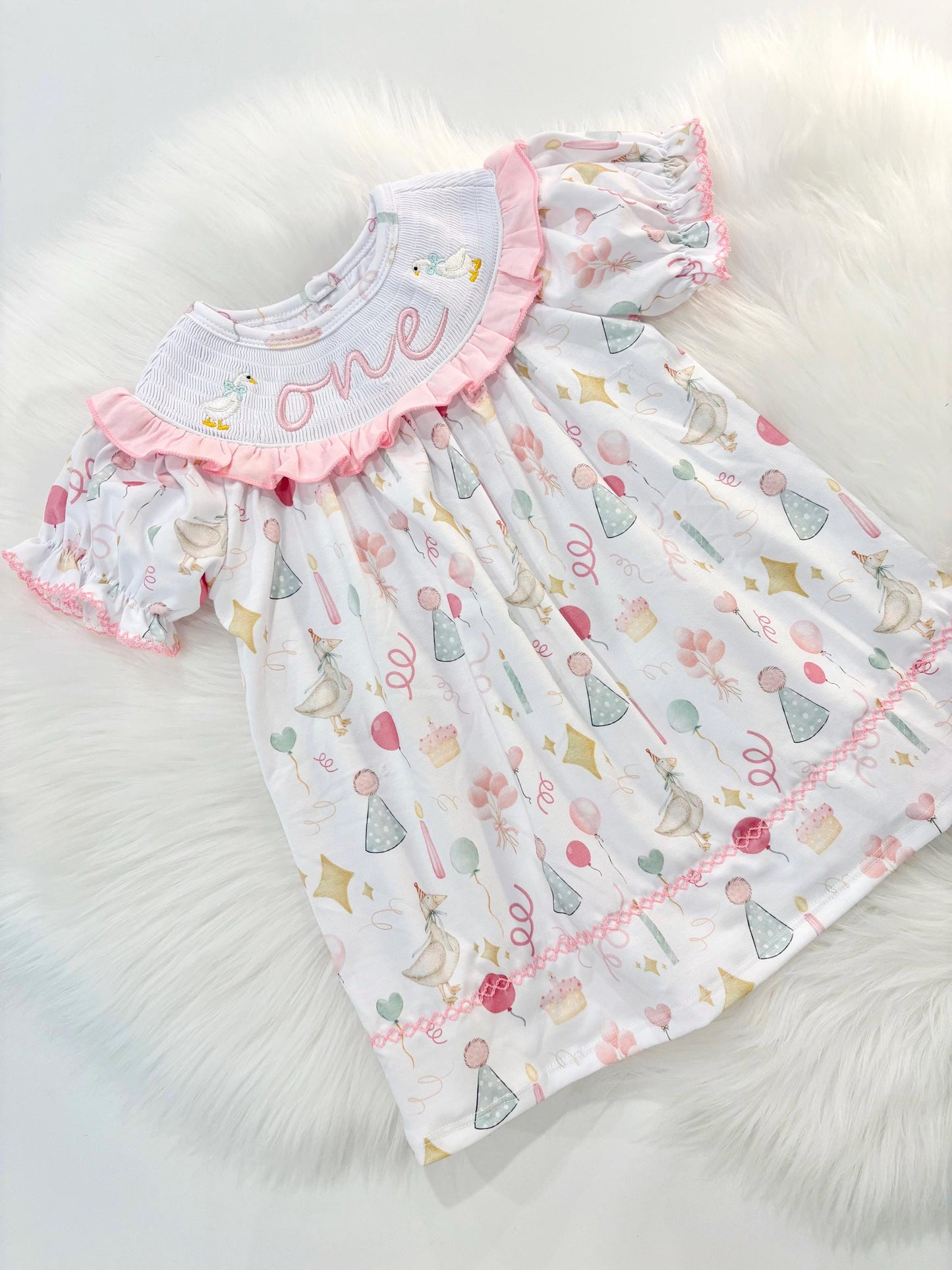 ONE Silly Goose First Birthday Girl Smocked Ruffle Dress The Mod Mango Baby Co. ONE Silly Goose First Birthday Girl Smocked Ruffle Dress The Mod Mango Baby Co.