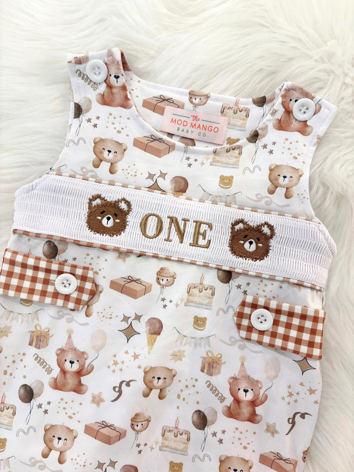 beary first birthday boy romper teddy bear shortalls brown tan beige white gingham smash cake outfit overalls, ONE smocked romper first birthday bears, teddy bear embroidered smocked spring summer fall 1st birthday boy outfit romper baby boys beary 1st birthday, neutral brown tan beige white shirt cake smash outfit, the mod mango baby boutique co