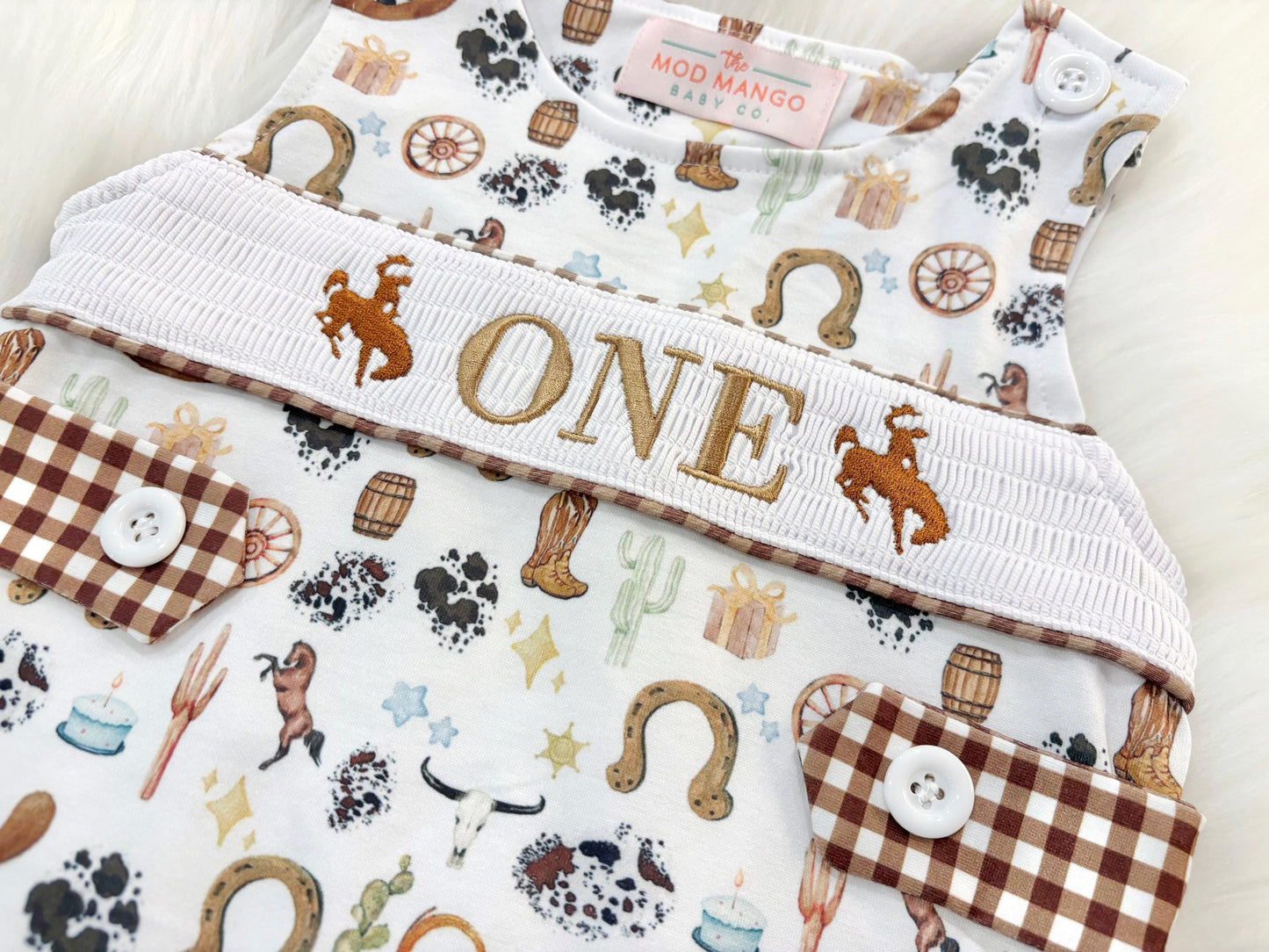 my first rodeo birthday boy romper cowboy western shortalls brown tan beige white gingham smash cake outfit overalls, ONE smocked romper first birthday cowboy, rodeo western cowboy embroidered smocked spring summer fall 1st birthday boy outfit romper baby boys rodeo 1st birthday