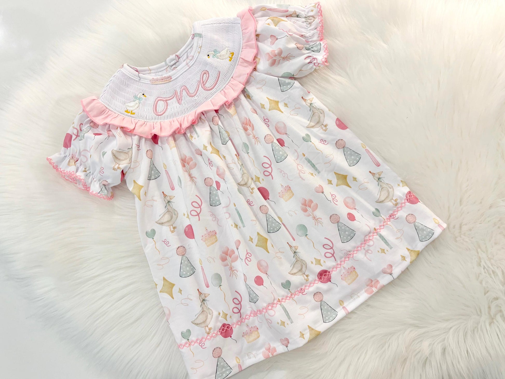 ONE Silly Goose First Birthday Girl Smocked Ruffle Dress The Mod Mango Baby Co. ONE Silly Goose First Birthday Girl Smocked Ruffle Dress The Mod Mango Baby Co.