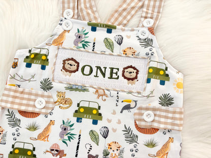 wild one safari first birthday boy romper camping hunter green white gingham tan beige brown smash cake outfit overalls, ONE smocked romper first birthday wild one safari, animals lion embroidered smocked spring summer 1st birthday boy outfit romper baby boys cake smash outfit, the mod mango baby boutique co