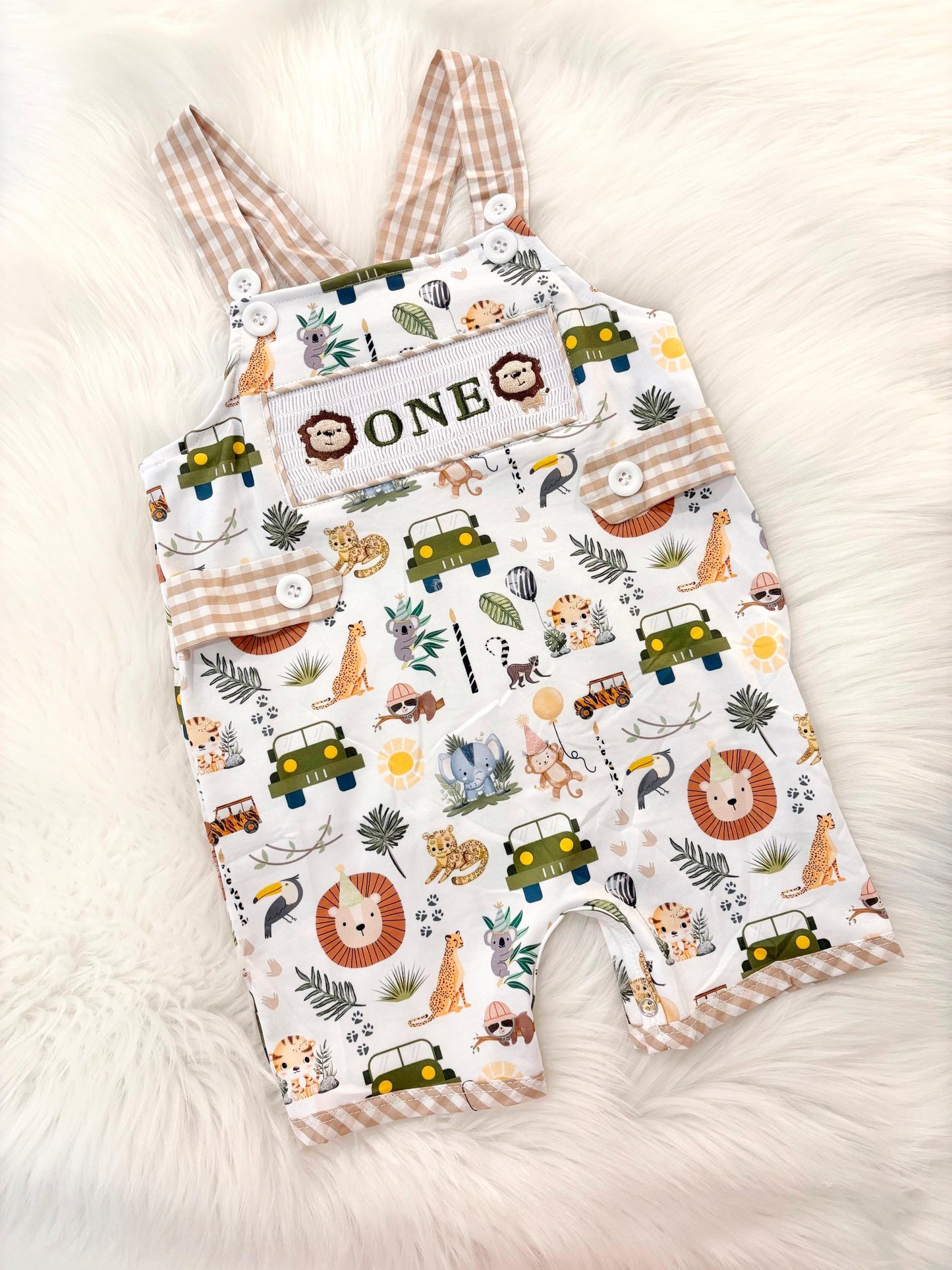 wild one safari first birthday boy romper camping hunter green white gingham tan beige brown smash cake outfit overalls, ONE smocked romper first birthday wild one safari, animals lion embroidered smocked spring summer 1st birthday boy outfit romper baby boys cake smash outfit, the mod mango baby boutique co