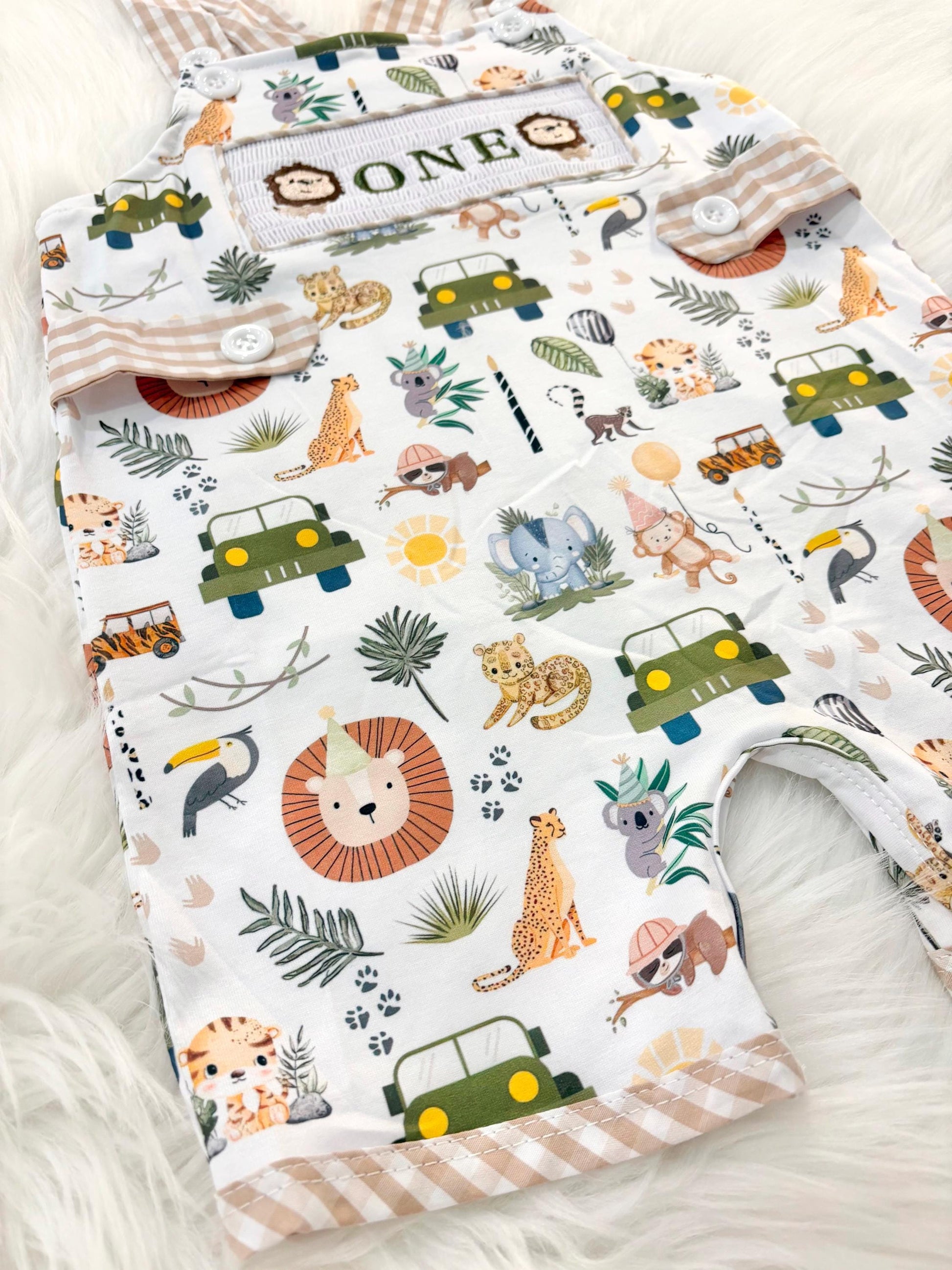 wild one safari first birthday boy romper camping hunter green white gingham tan beige brown smash cake outfit overalls, ONE smocked romper first birthday wild one safari, animals lion embroidered smocked spring summer 1st birthday boy outfit romper baby boys cake smash outfit, the mod mango baby boutique co