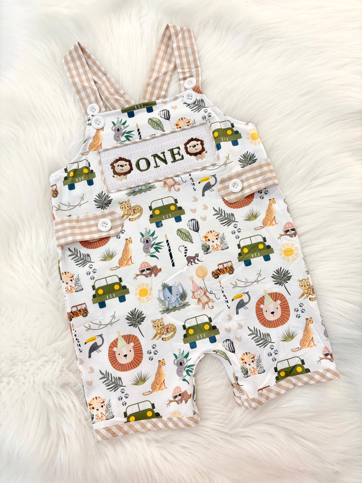 wild one safari cake smash outfit first birthday boy romper camping hunter green white gingham tan beige brown smash cake outfit overalls, ONE smocked romper first birthday wild one safari, animals lion embroidered smocked spring summer 1st birthday boy outfit romper baby boys cake smash outfit, the mod mango baby boutique co