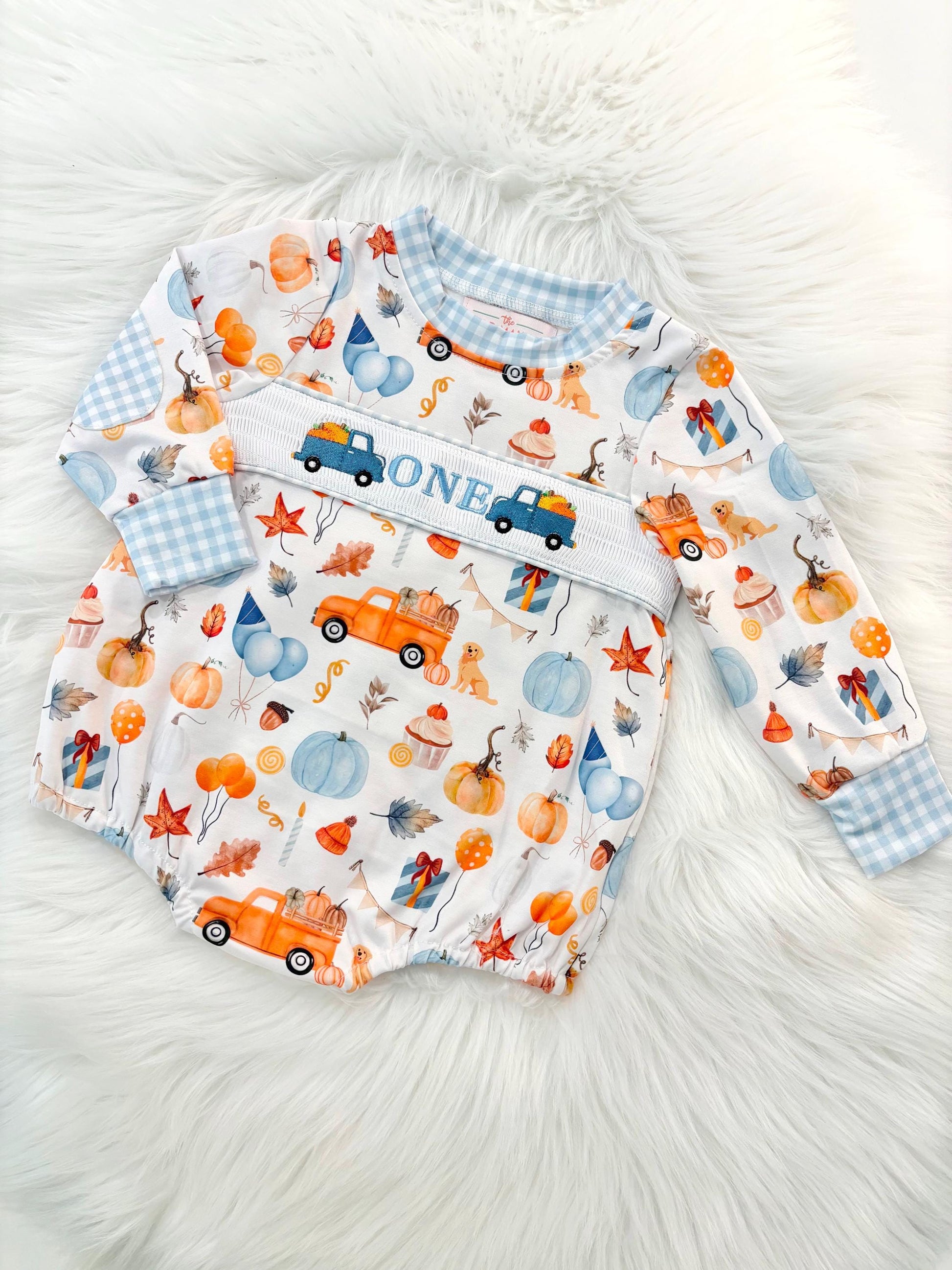 little pumpkin one shirt first birthday boy romper fall orange blue white gingham checkered outfit, ONE smocked bubble romper first birthday fall pumpkins puppy dog truck leaves blue pumpkin, pumpkin truck embroidered smocked 1st birthday outfit romper baby boys, the mod mango baby co baby boutique