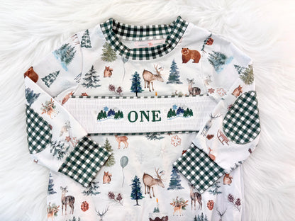 Christmas winter onederland wonderland shirt first birthday boy romper holiday blue brown hunter green white gingham checkered outfit, ONE smocked bubble romper first birthday bear pine trees deer woodland animals, snowflake and pine trees embroidered smocked 1st birthday outfit romper baby boys, the mod mango baby co baby boutique